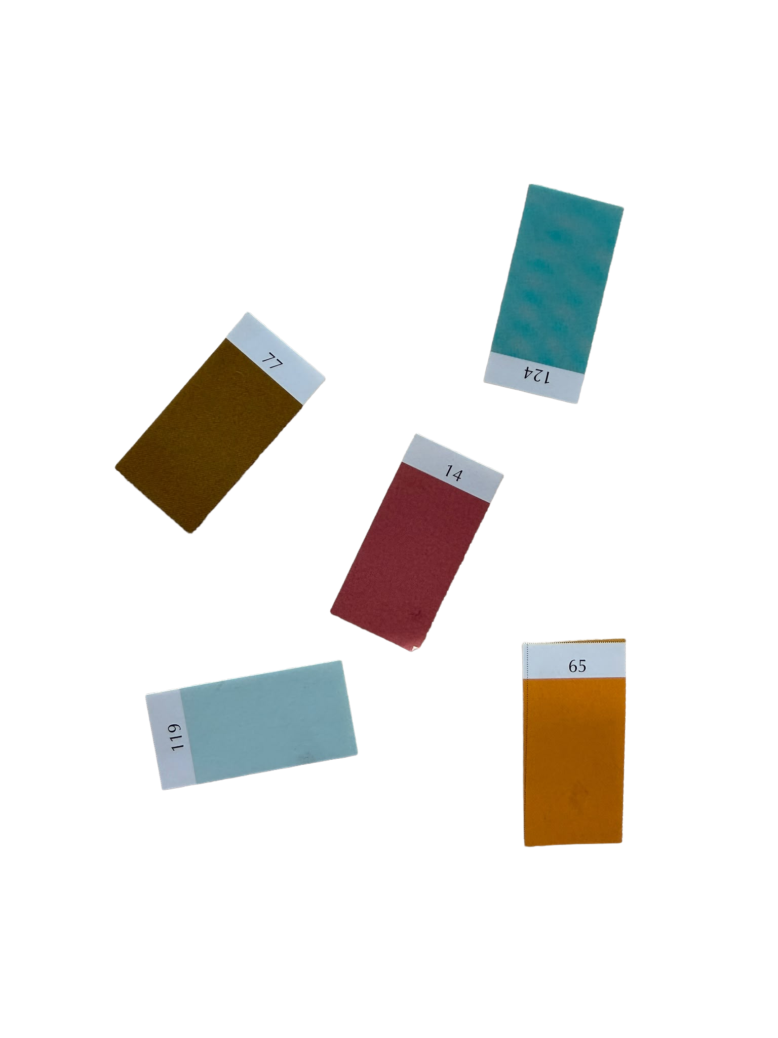 Color swatches or paint sample cards with numbers 11, 14, 19, 65, 114, 124, and 77