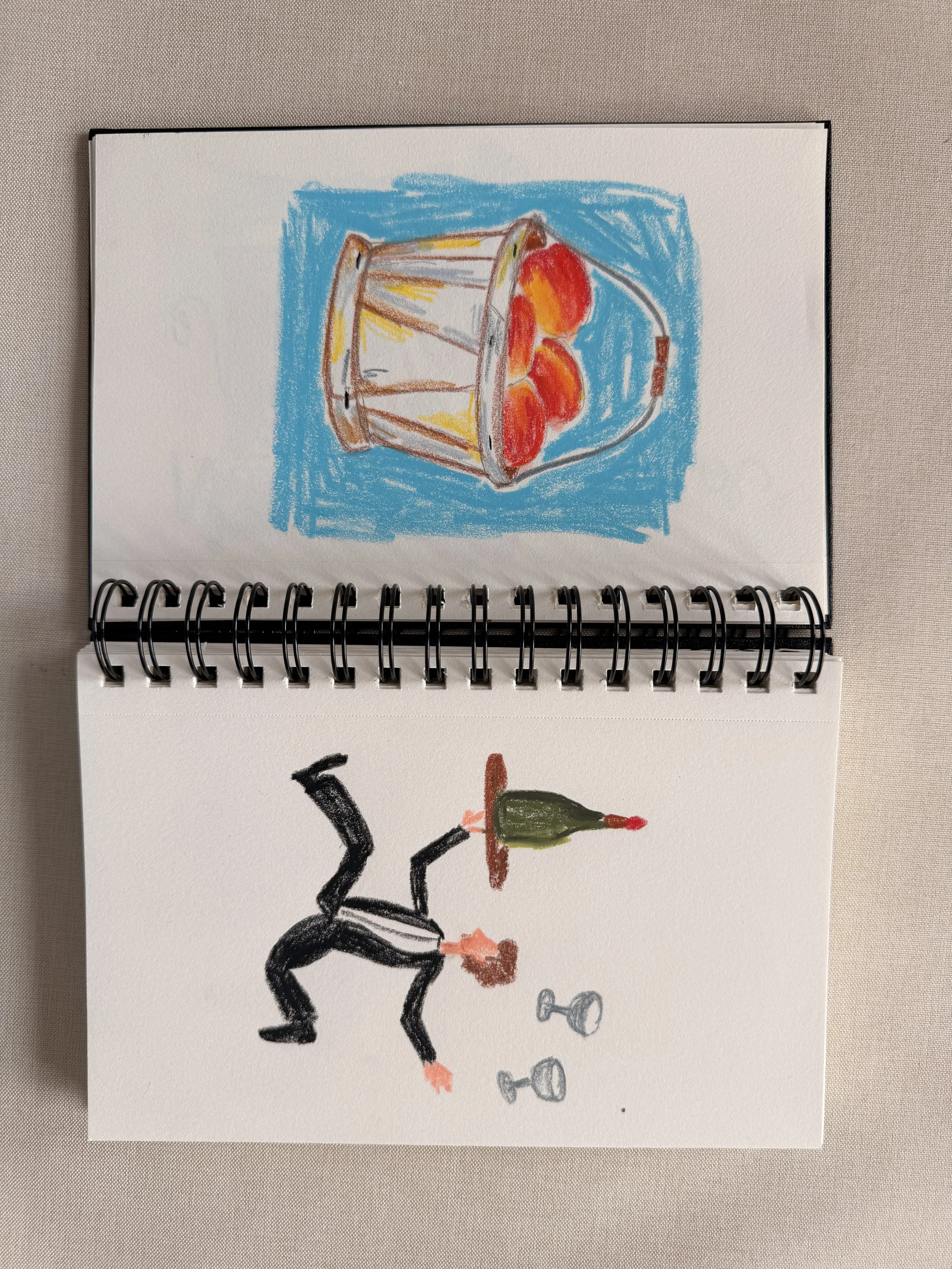Sketchbook illustration of a drink with orange slices against a blue background