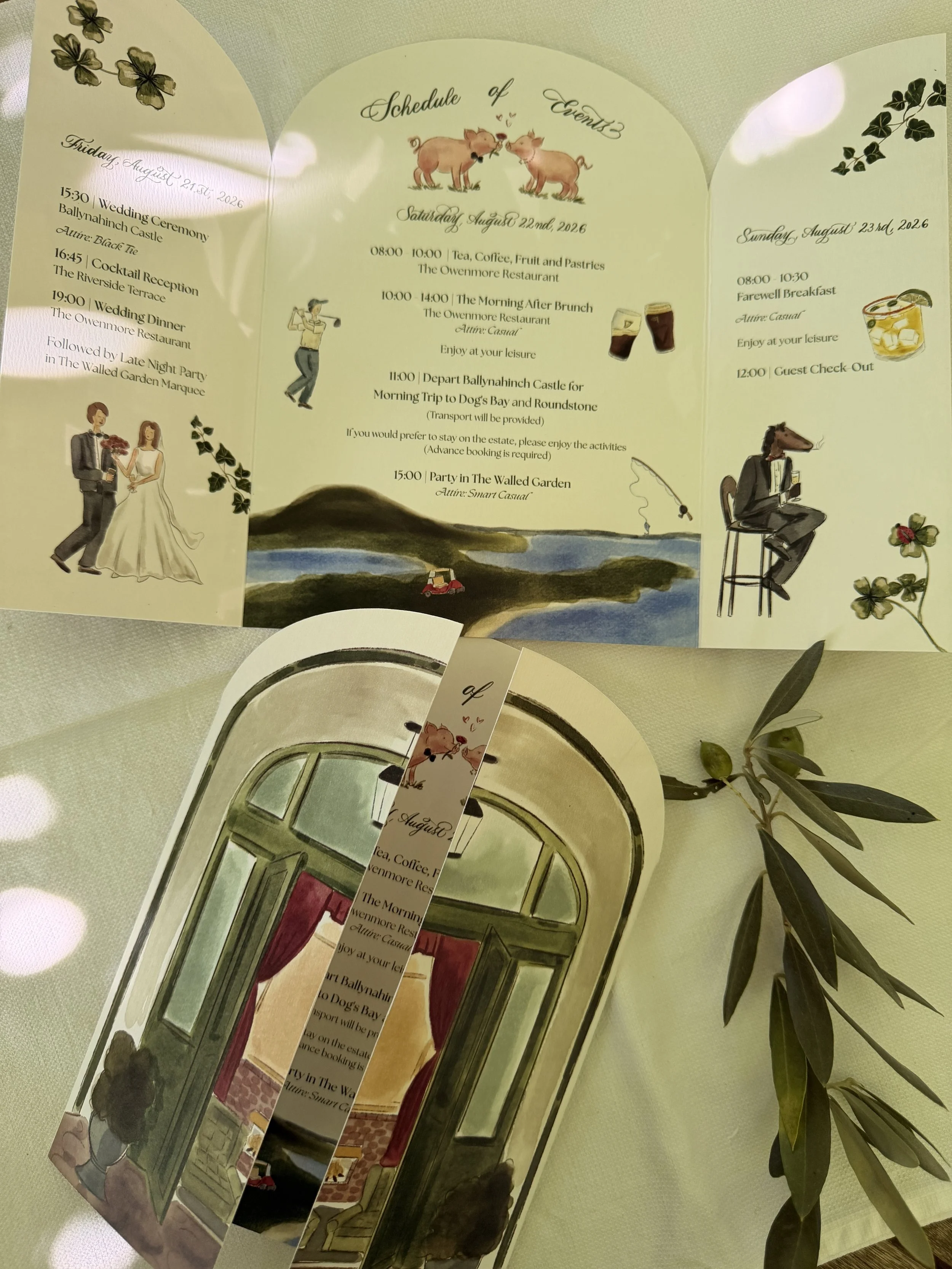 Close-up of the finishing details on an illustrated wedding invitation suite