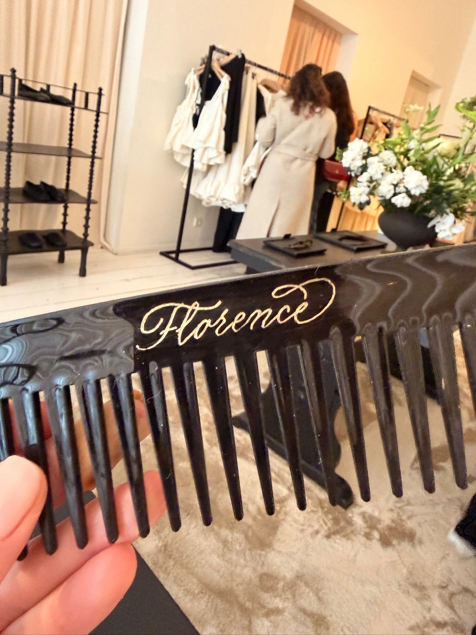 	
Hand Engraving comb using Calligraphy by Gaia Amsterdam for NAKD pop up in Amsterdam
