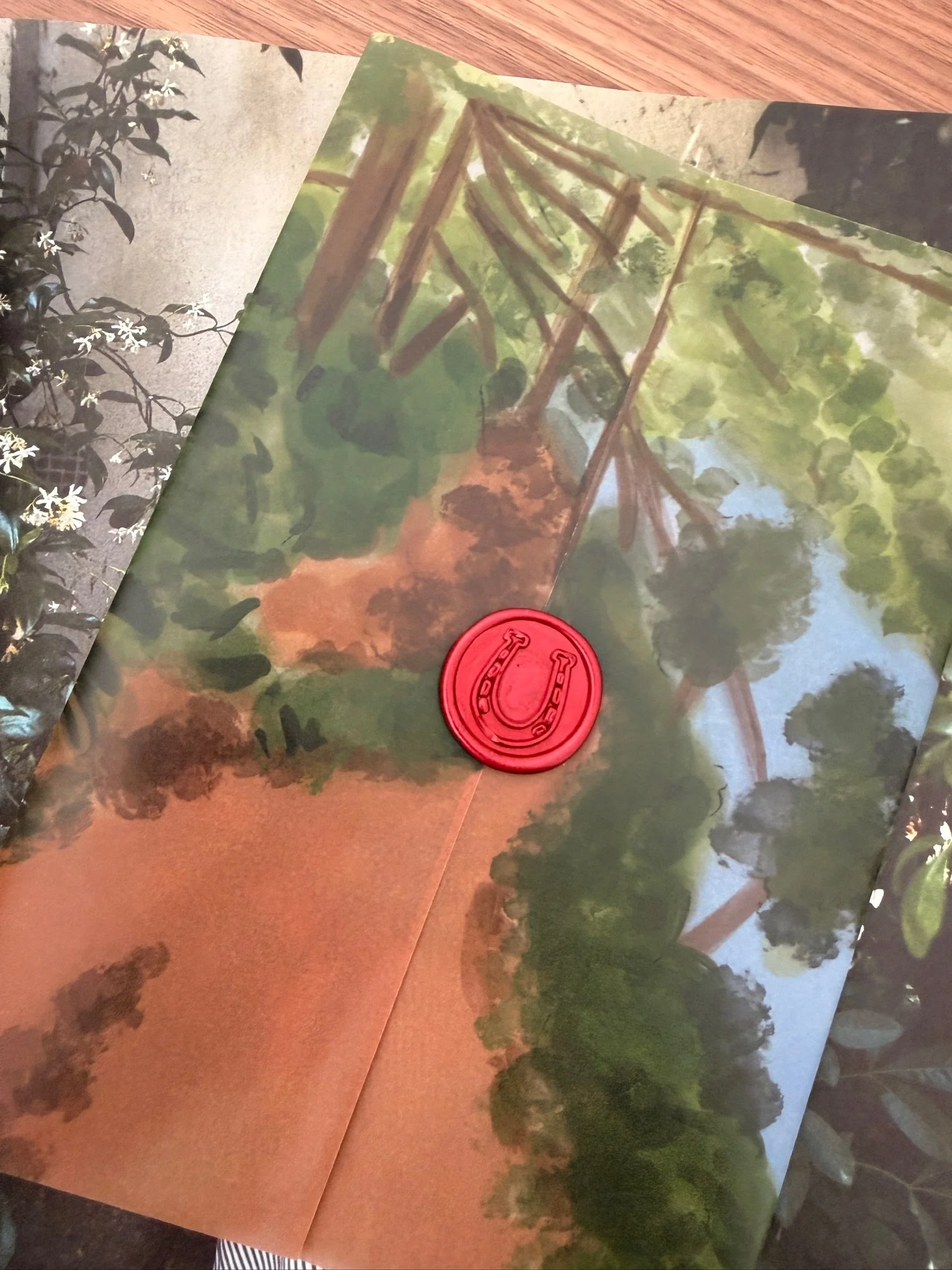 Close-up of the folded construction of a custom wedding invitation