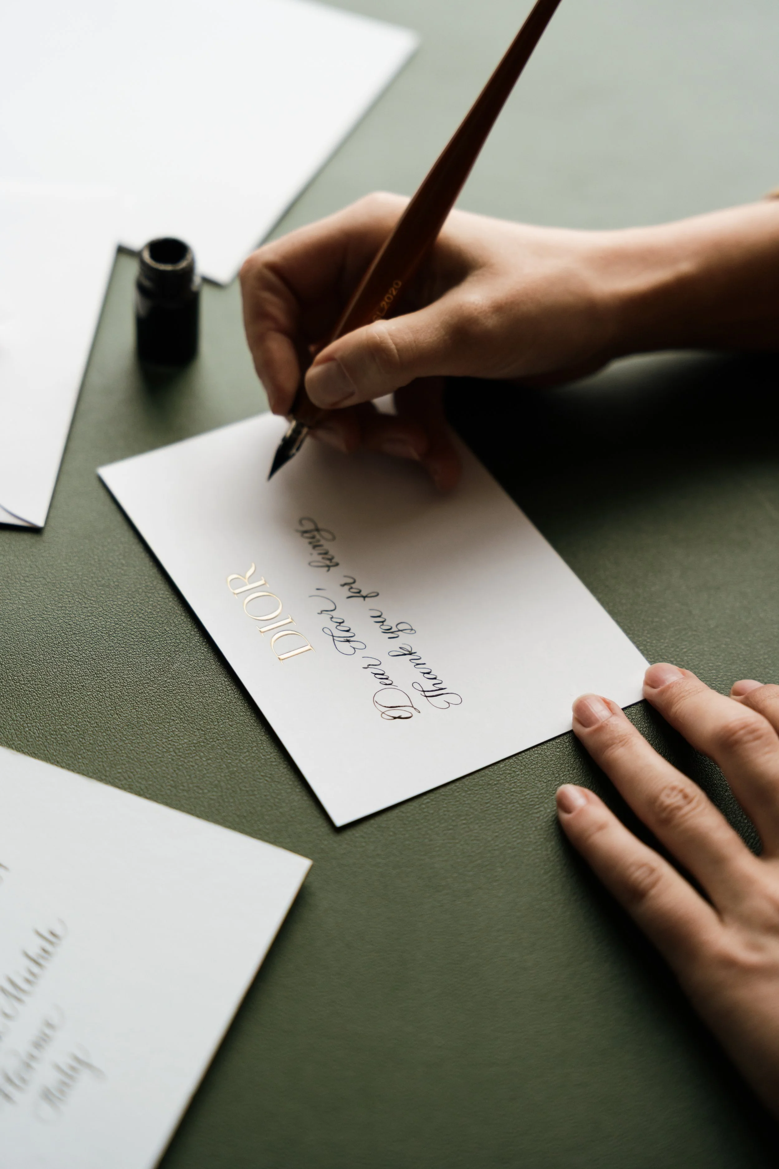 Flourished calligraphy lettering created with a pointed nib