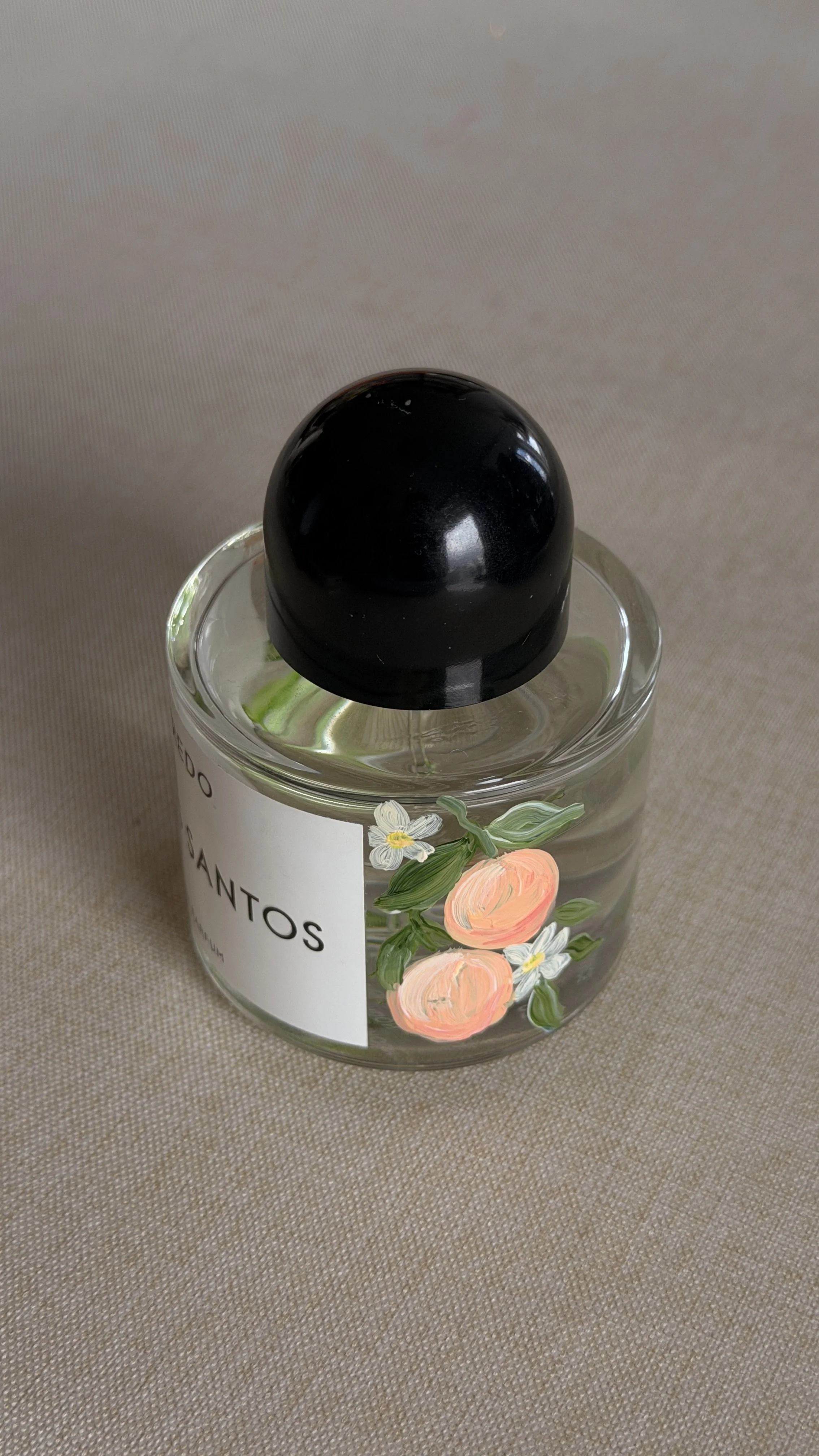 Painting on a bottle of Byredo "De Los Santos"