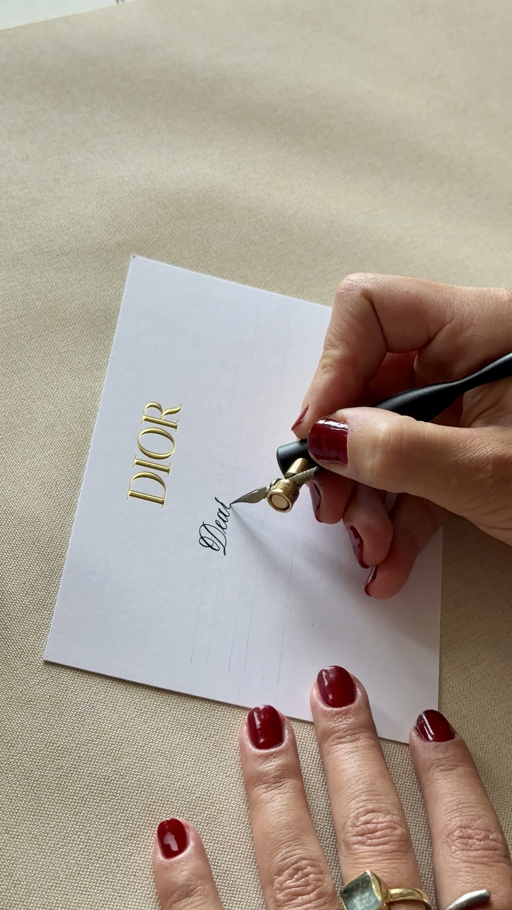Bespoke calligraphy lettering created by hand in Amsterdam for luxury brands.
