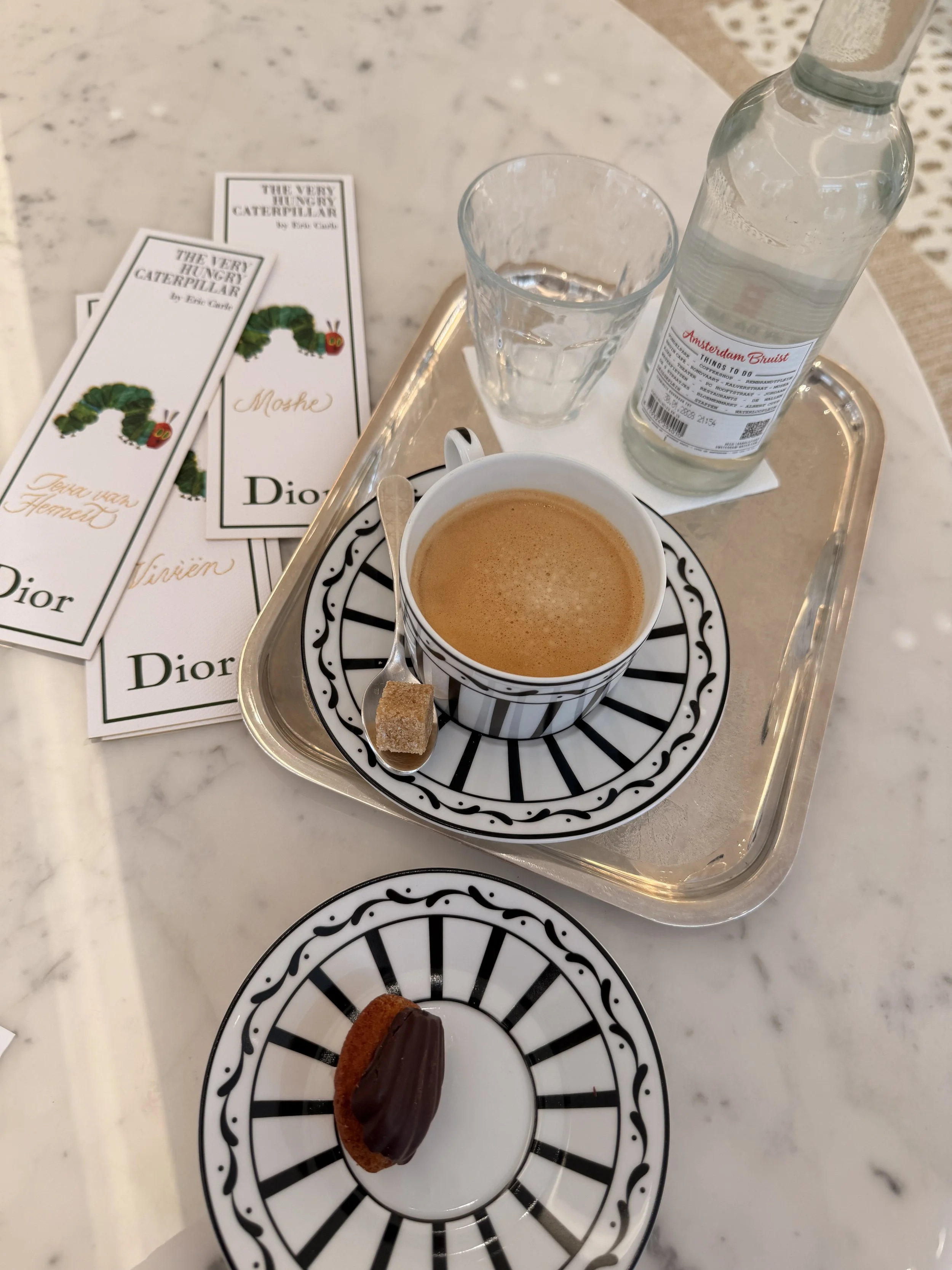 Coffee at Dior at an activation doing hot foiling calligraphy.