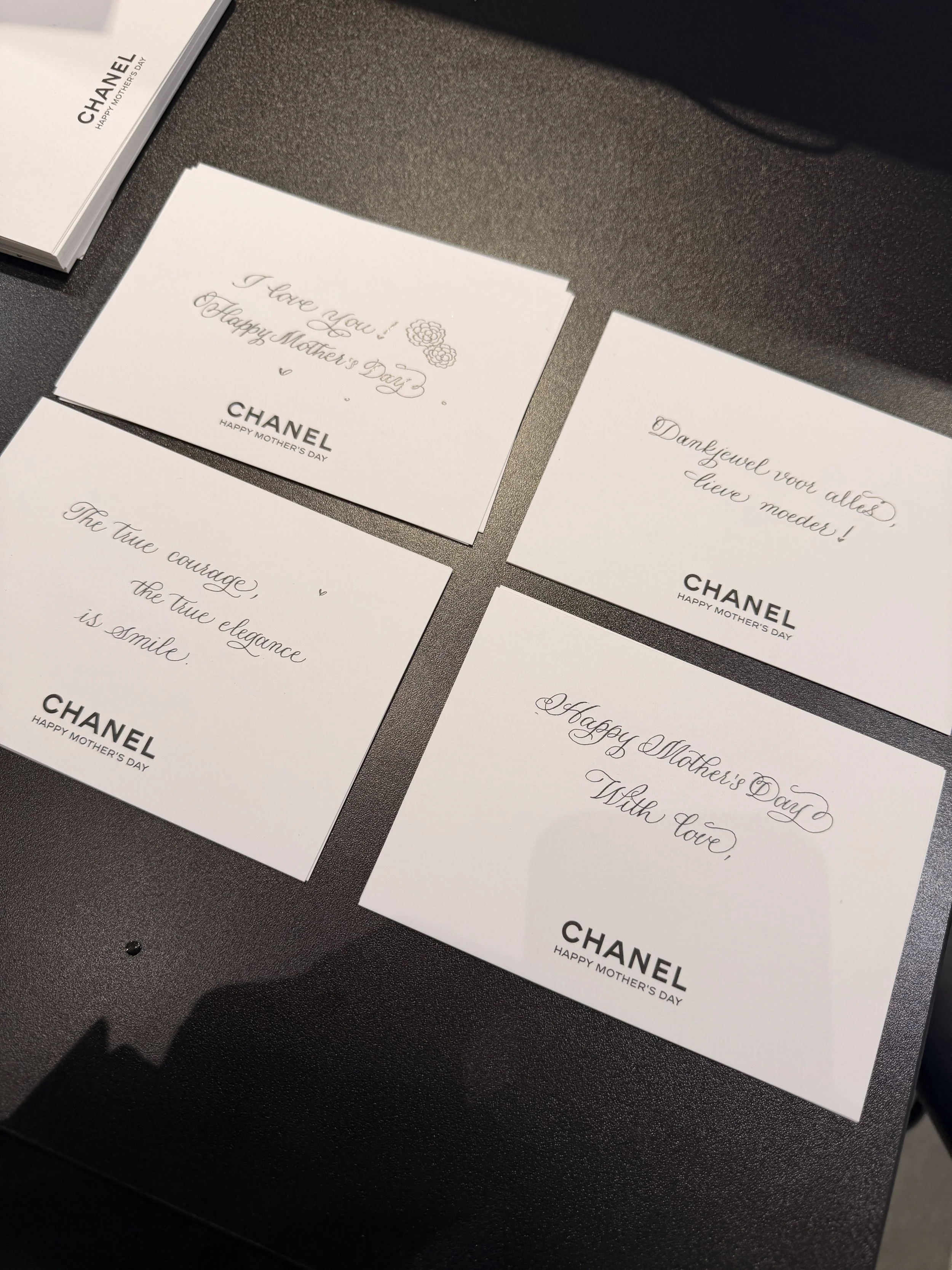 Close-up of handwritten lettering on luxury gifting stationery
