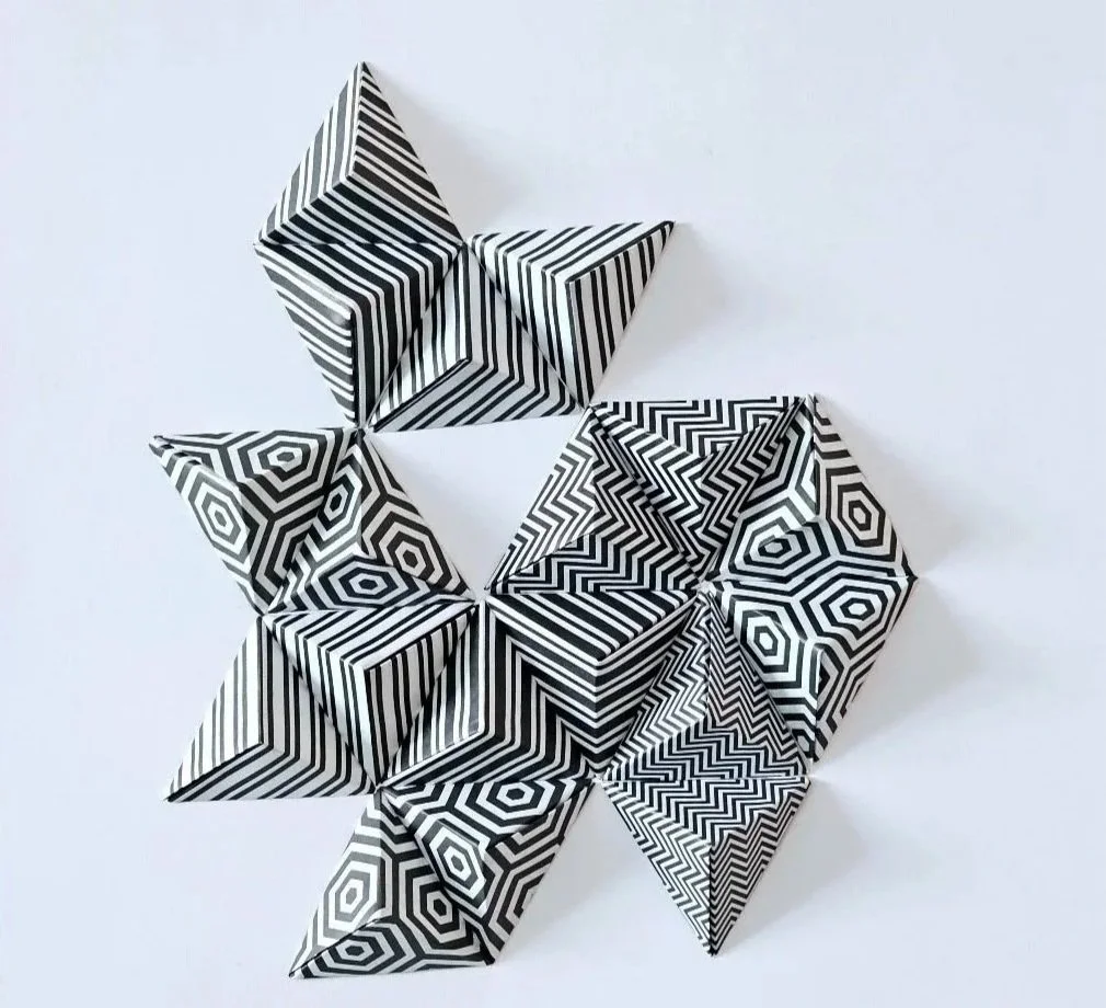 Illusion I · 2024 · Hand-folded artisan paper on paper · 11 x 14 x 3 in · Private Collection