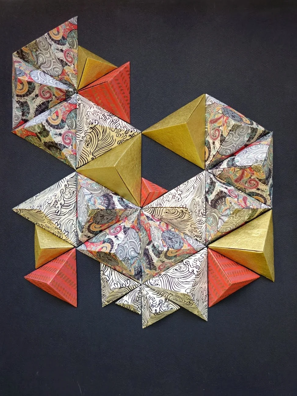 Chk Chk Boom · 2024 · Hand-folded artisan paper on paper · 16 x 20 x 4 in · Private Collection