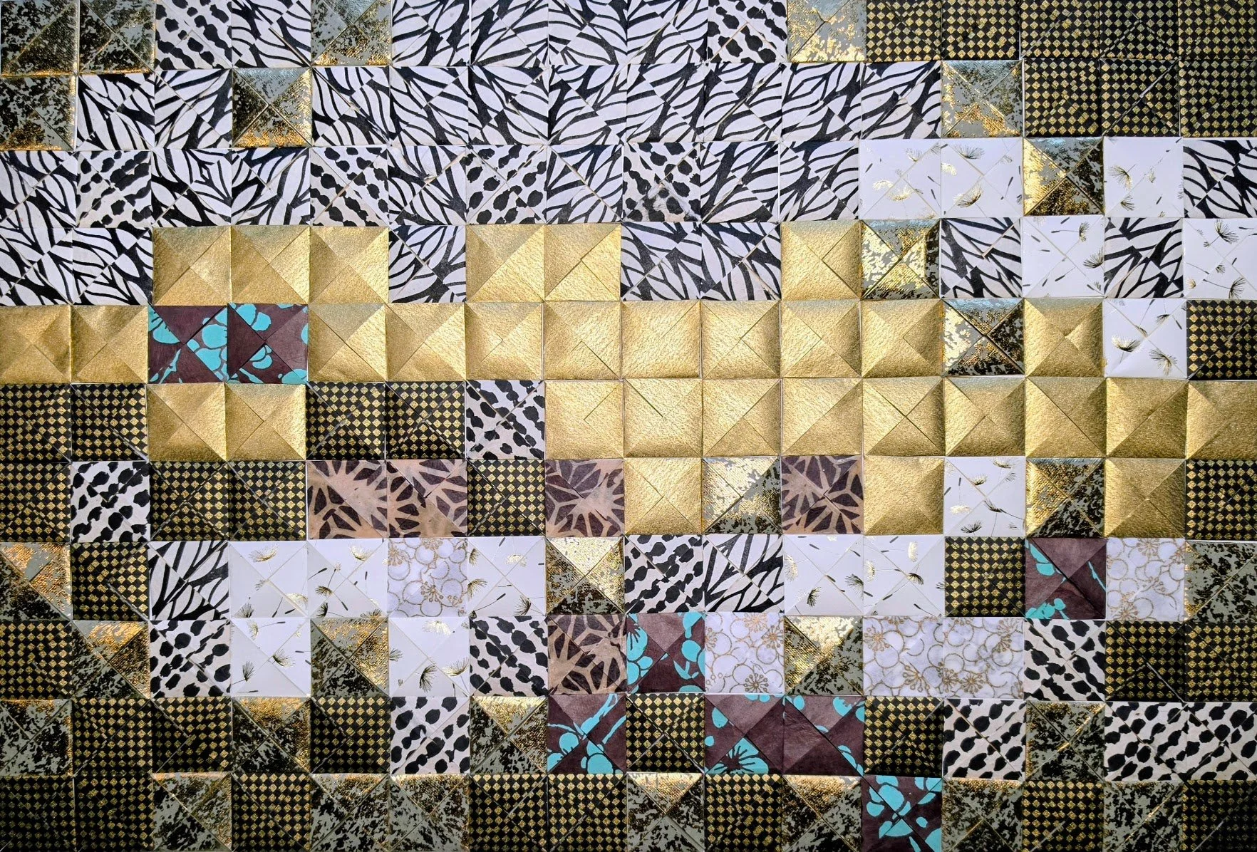 Tuttu Migration · 
Hand-folded artisan paper assemblage · 18 × 24 in · 2025 · Available