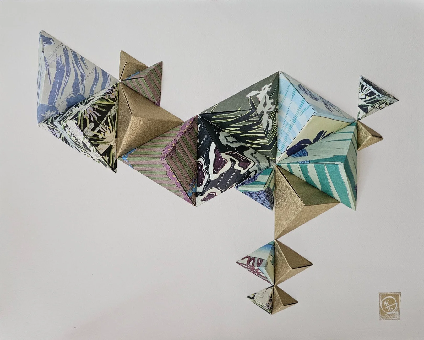 Under my Umbrella · 2024 · Hand-folded artisan paper on paper · 16 x 20 x 4 in · Private Collection