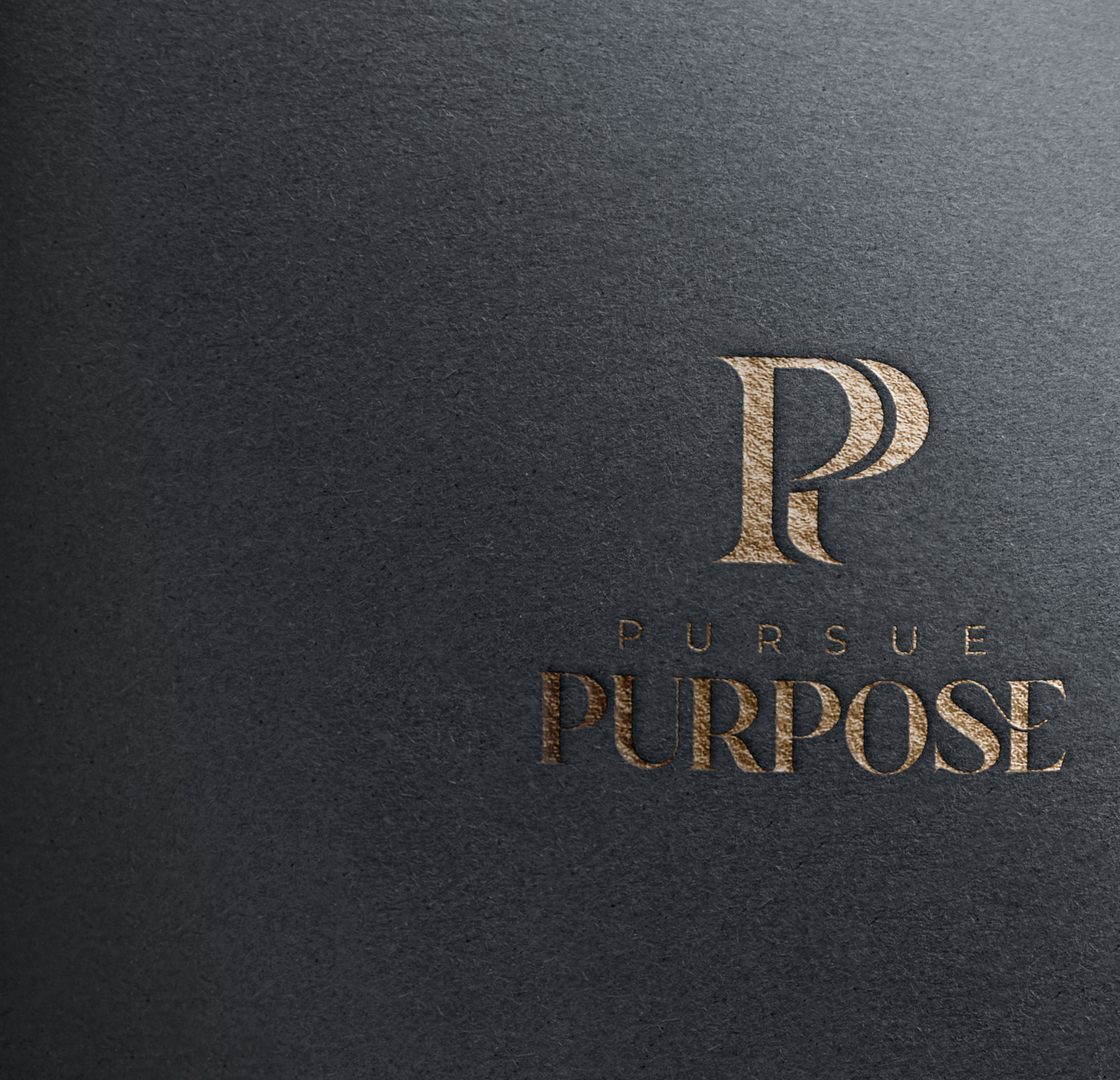 Close-up of a black textured background with a partial view of the word 'PURPOSE' in metallic gold letters.