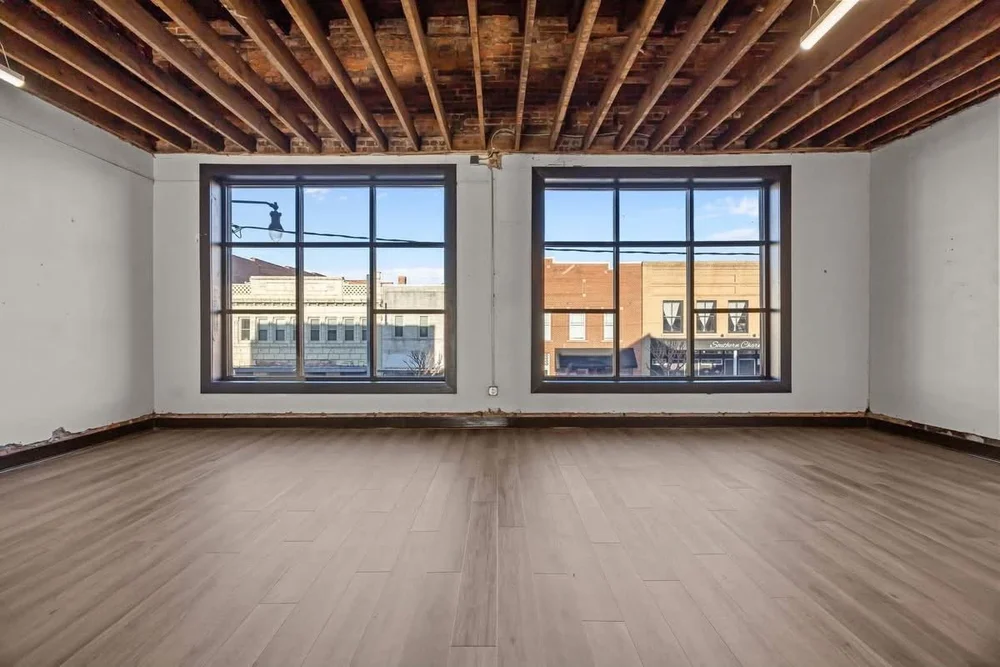 Large front windows and open floor at Steps on Garnett