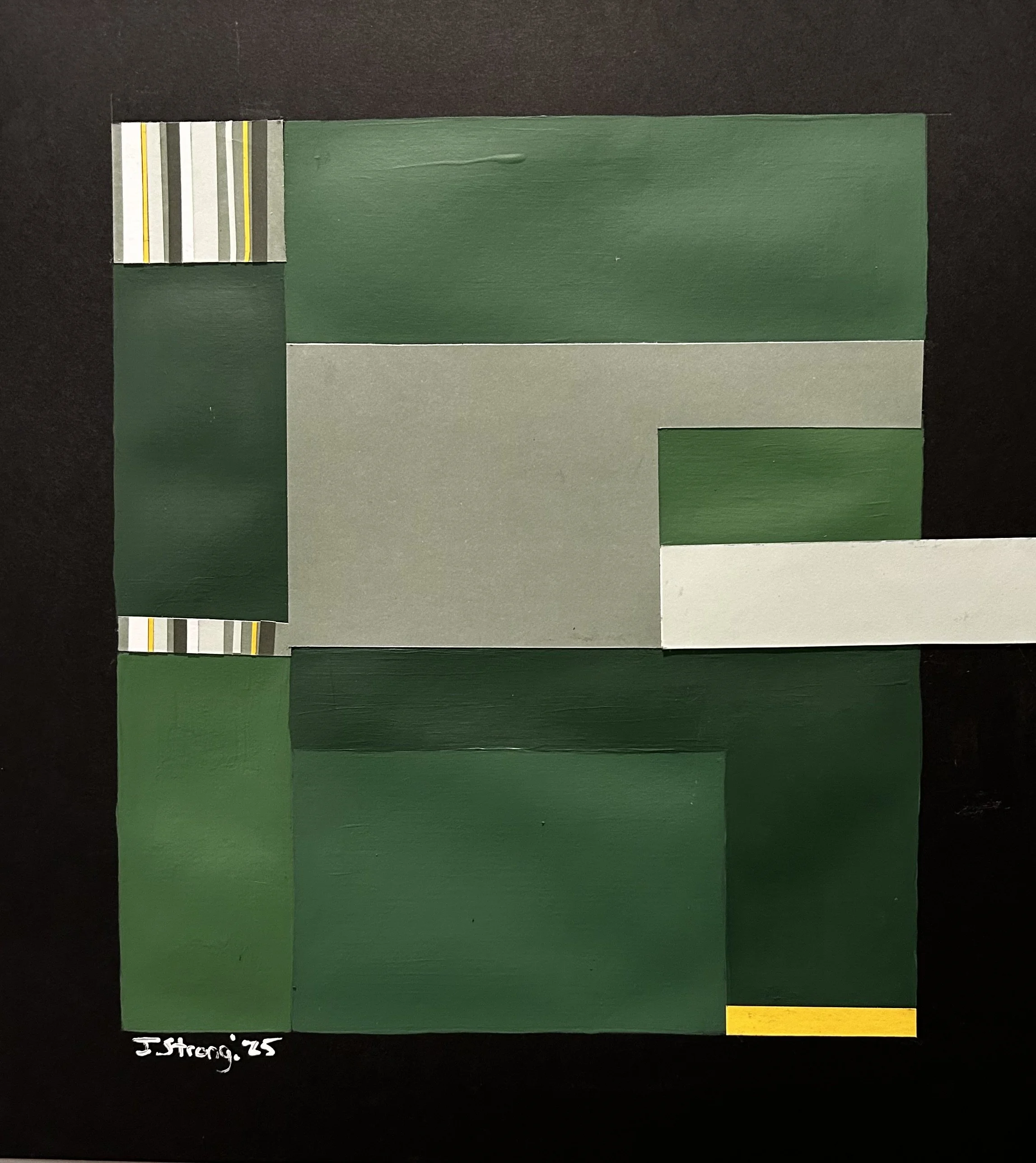 Collection of paint swatches and color samples in various shades of green, gray, and white arranged on a dark background.