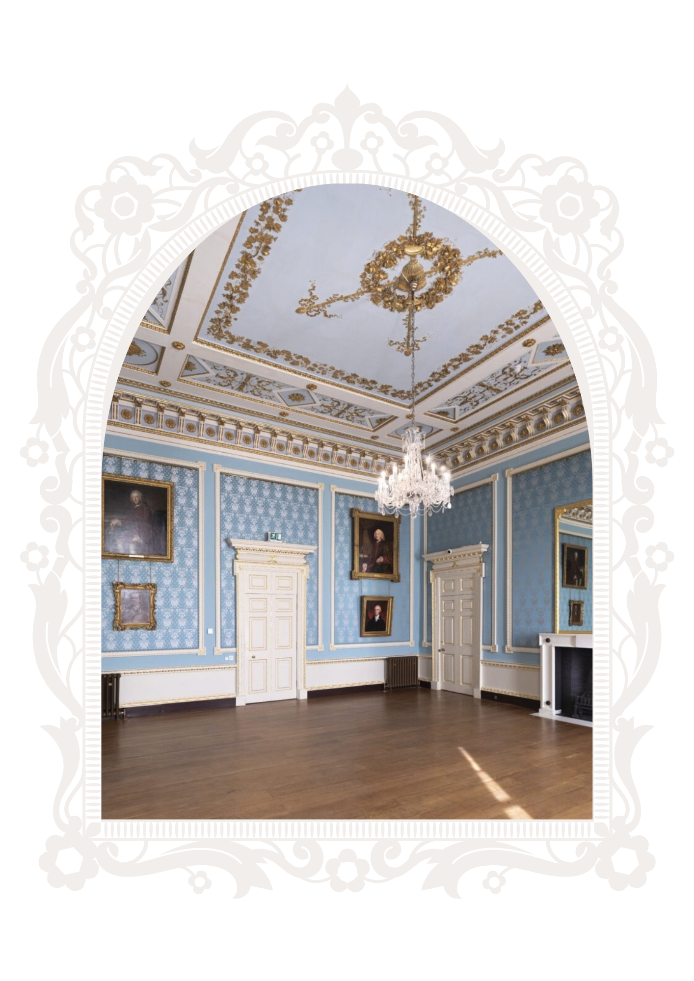A room with blue wallpaper, white and gold decorative moldings, and portraits hanging on the walls. There is a chandelier hanging from a decorated ceiling and a white fireplace on the right.