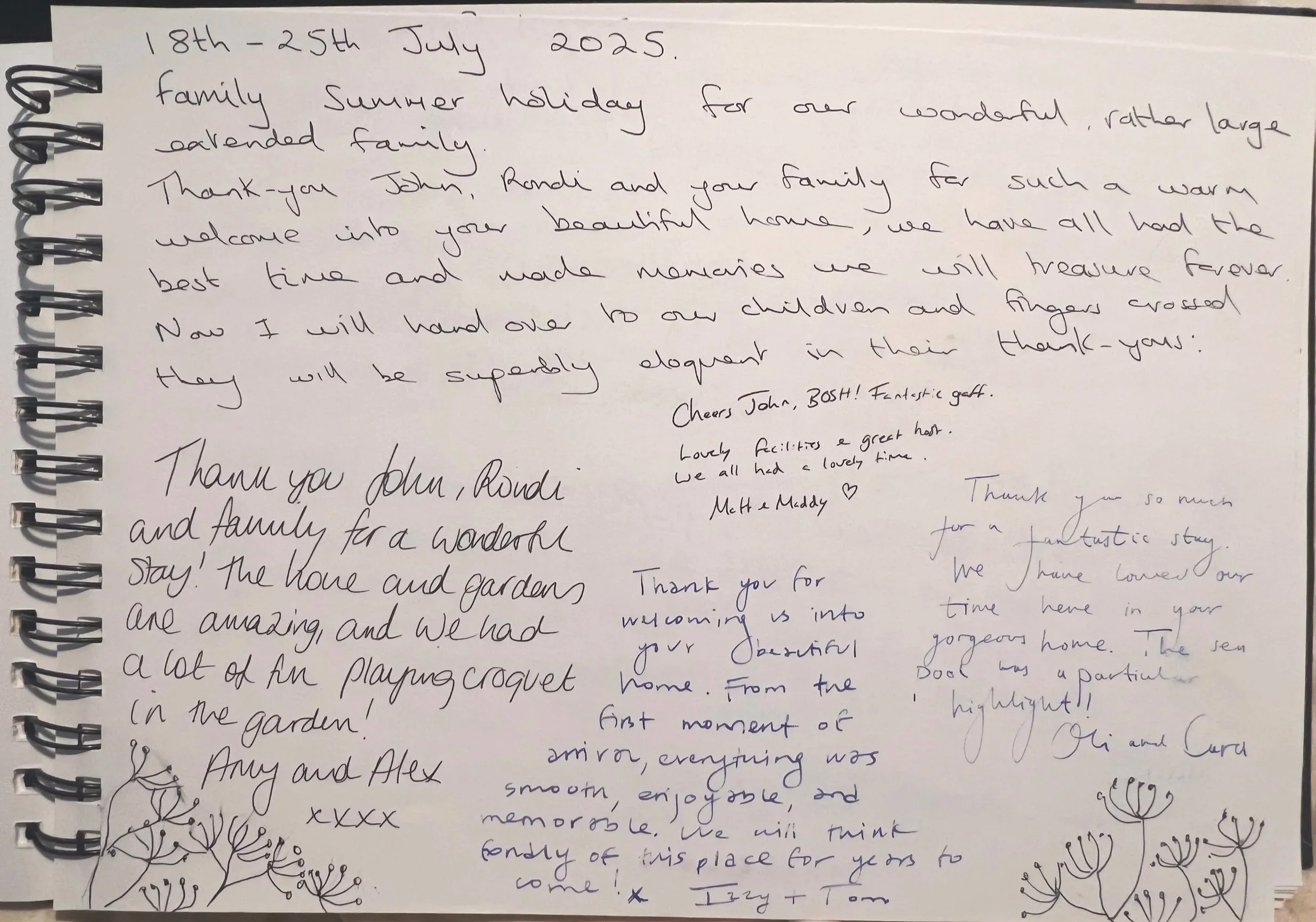 Handwritten letter on a spiral notepad with sketches of trees and flowers at the bottom at Parnacott house.