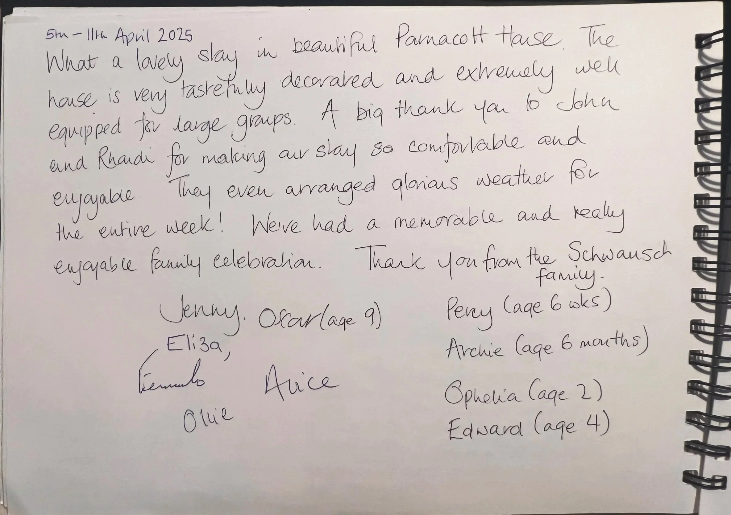 A handwritten thank you note on a white spiral-bound notebook page, dated April 5th to 11th, 2025, expressing gratitude for a stay at Pamcott House, mentioning the decor, weather, and hospitality, signed by various family members including Jenny, Oscar, Alicia, Percy, Archie, and Edward.