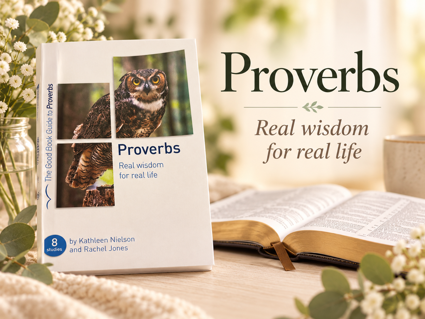 A book titled "Proverbs" with an owl on the cover, placed on a wooden surface next to an open Bible. The background has a sign that reads "Proverbs: Real wisdom for real life," surrounded by soft natural light and flowers.