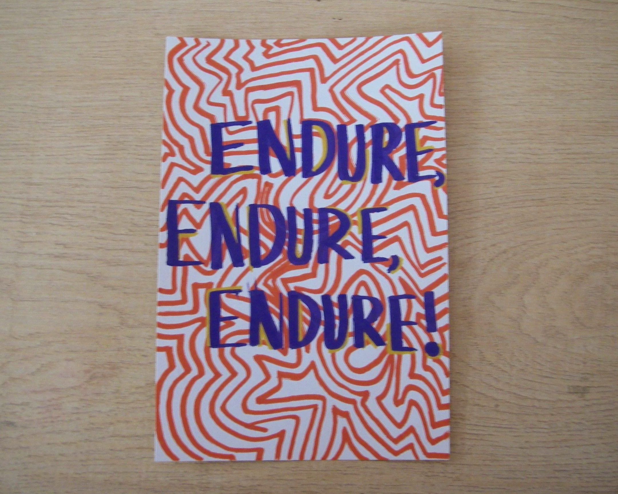 Colorful paper with wavy orange and white background pattern, with the words 'ENDURE, ENJOY, EXPLORE!' written in bold, blue letters with yellow outlines.