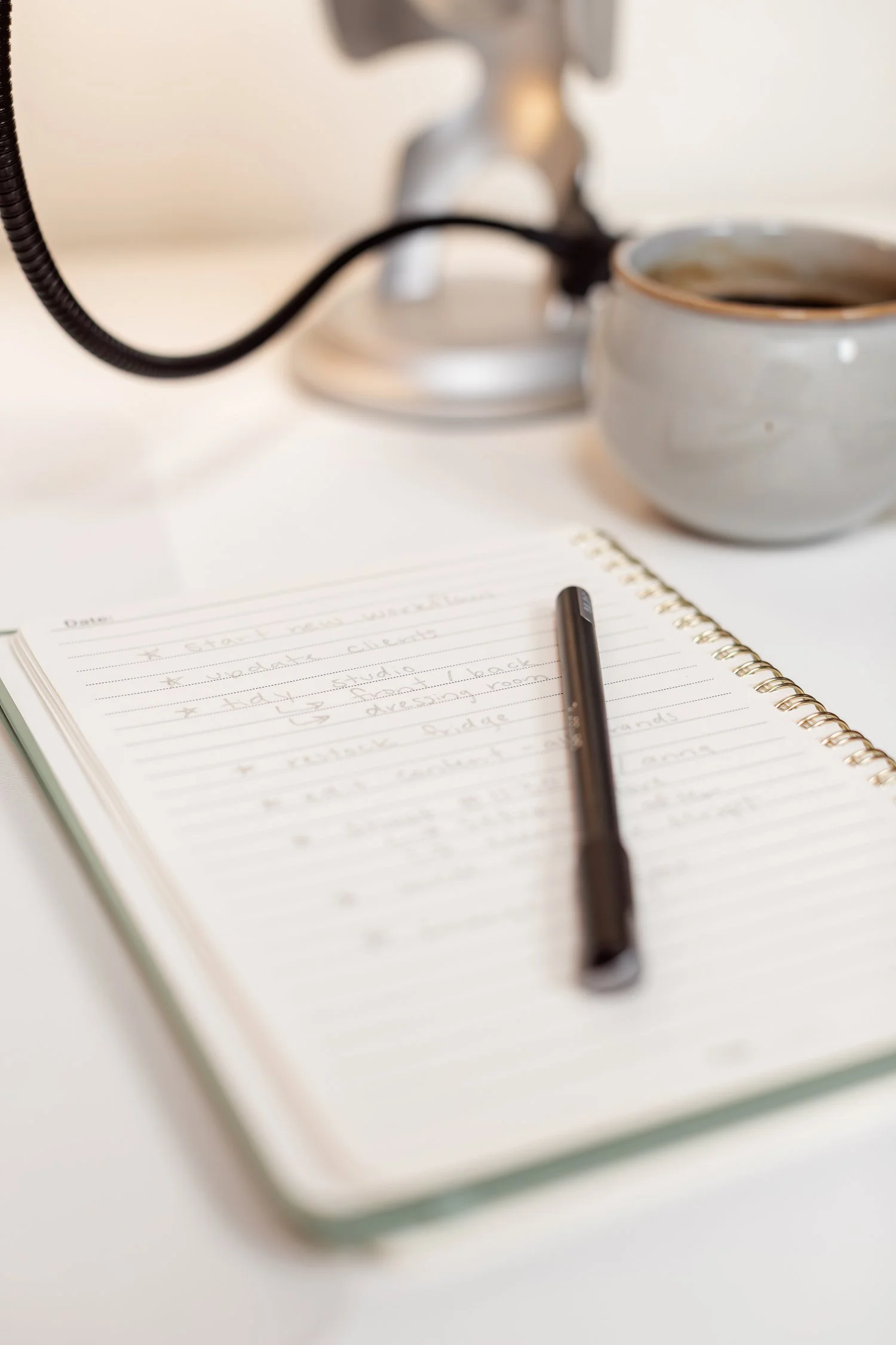 Notebook and pen ready to plan a content project.