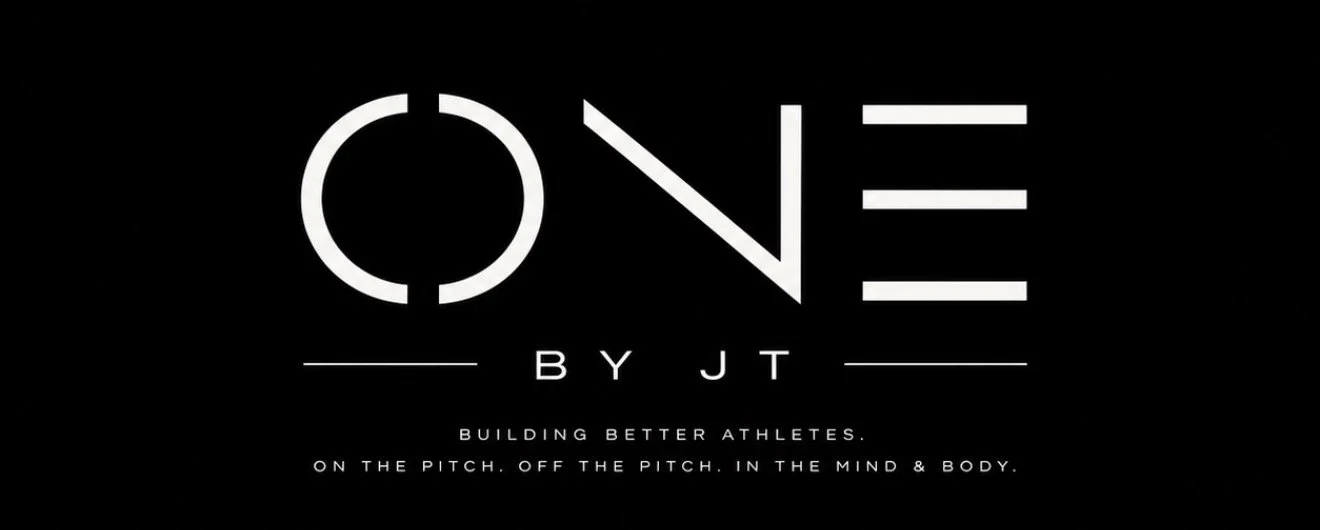 Black background with white text reading "ONE BY JT" and the tagline "building better athletes. on the pitch. off the pitch. in the mind & body."