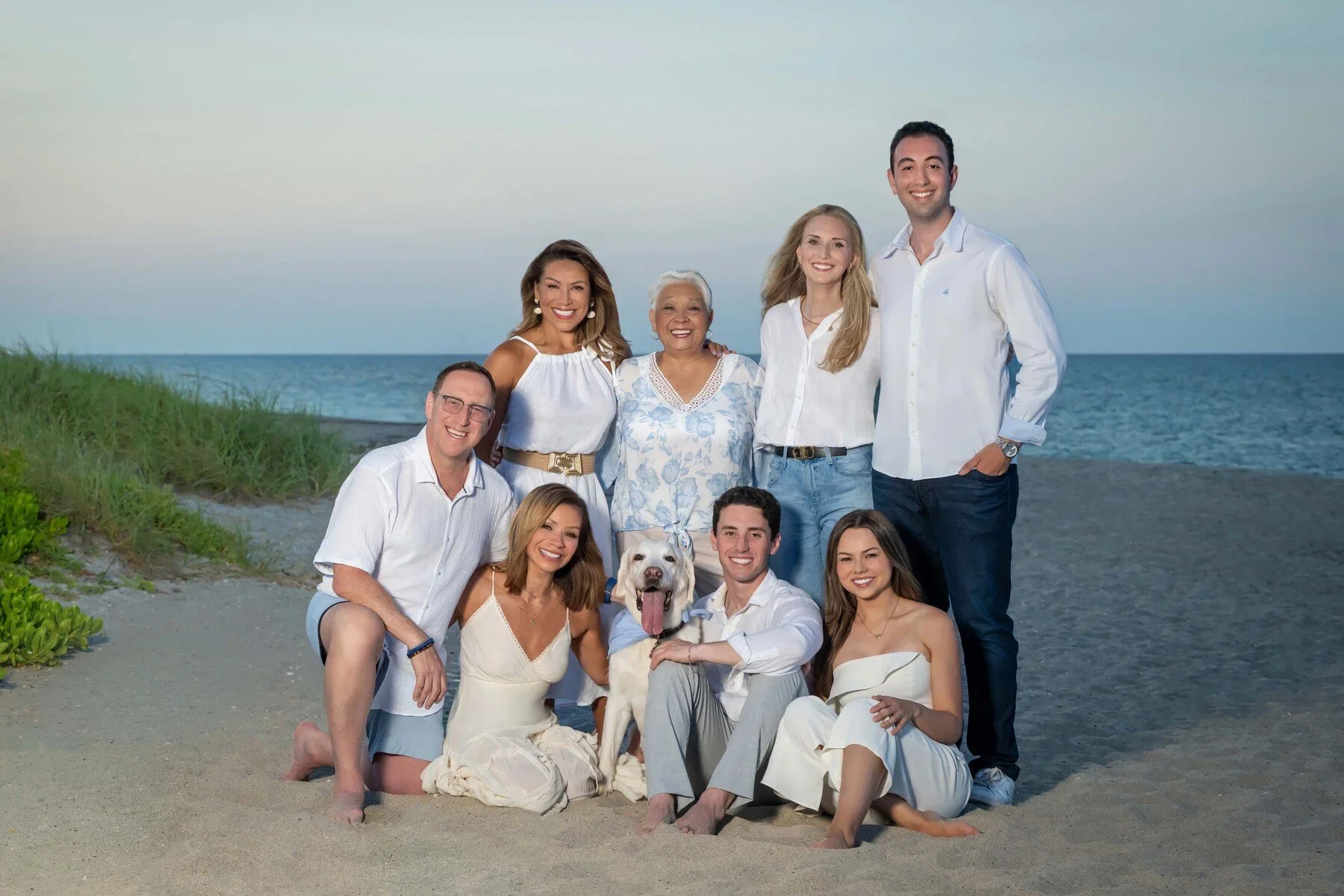 Outdoor multi-generation family portrait on the beach dunes in white and blue, South Florida family photography by Vasi Studio