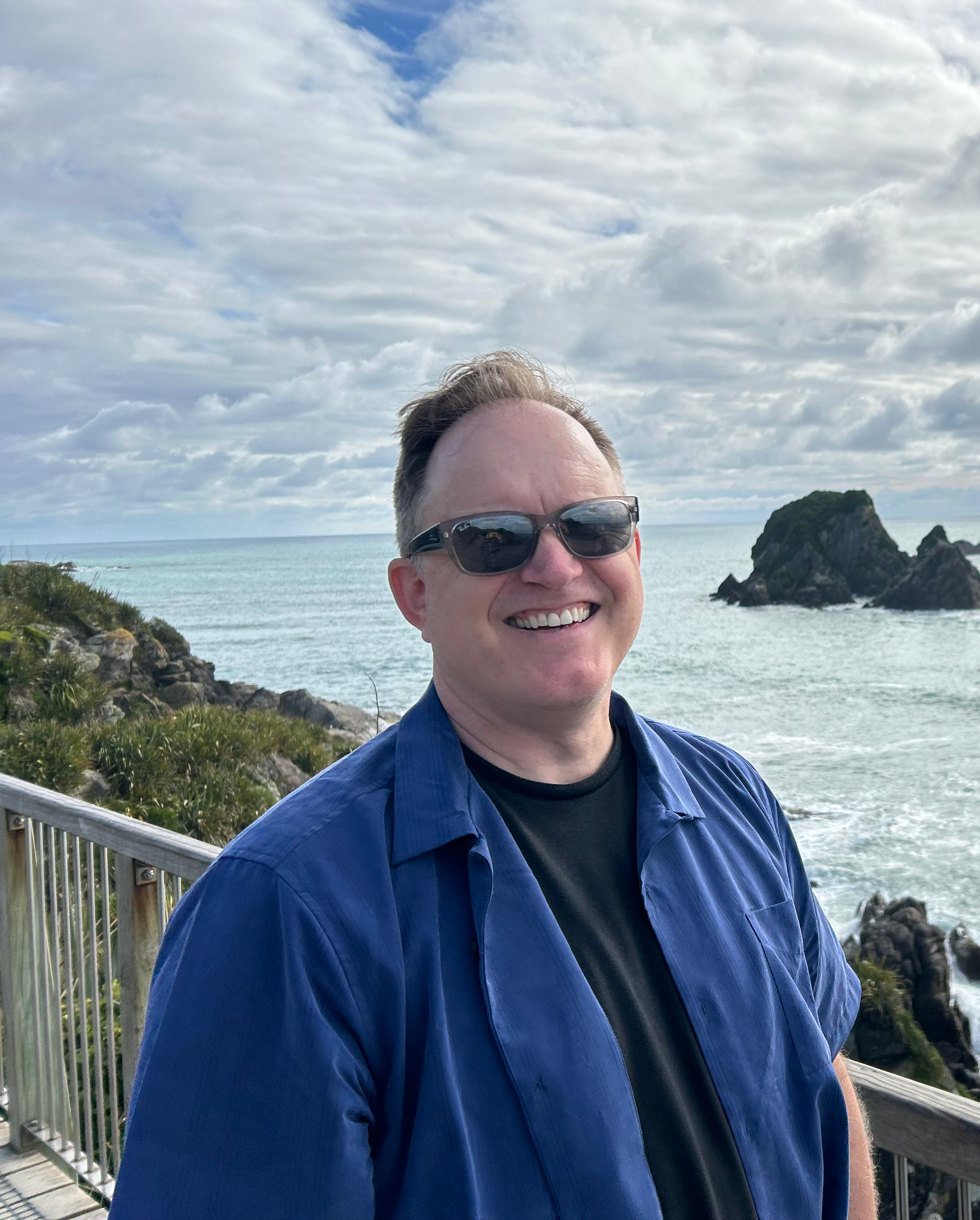 Jamison Selby in New Zealand by the ocean