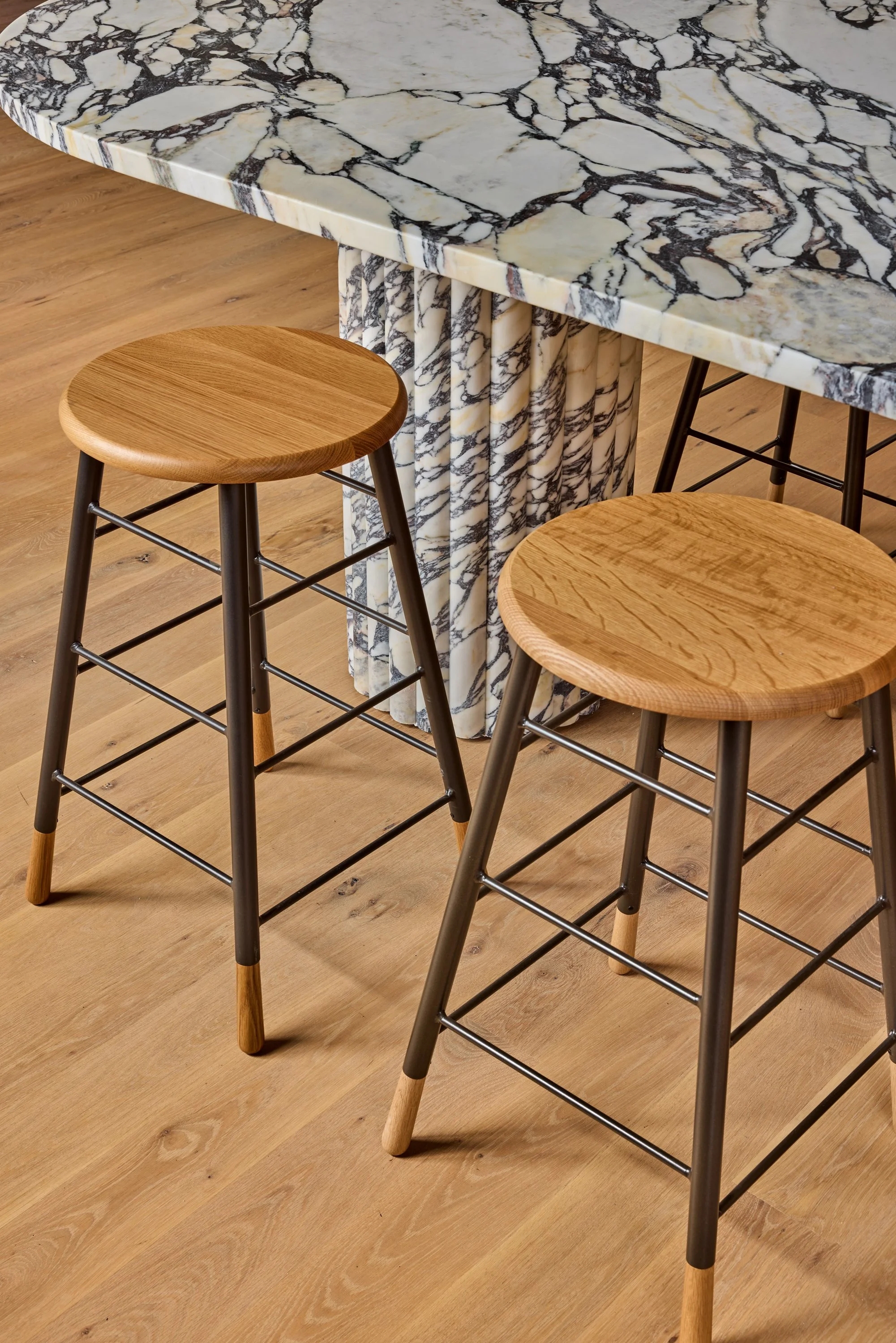counter stool and calcutta viola marble island