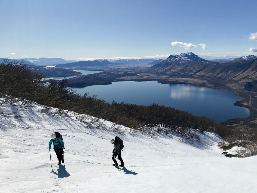 Two guests climbing on Mount Tenerife, on a guiding climbing trip with Paine Mountain Guides, a locally owned and operated guides company that run many different trips in Torres del Paine National Park, Patagonia