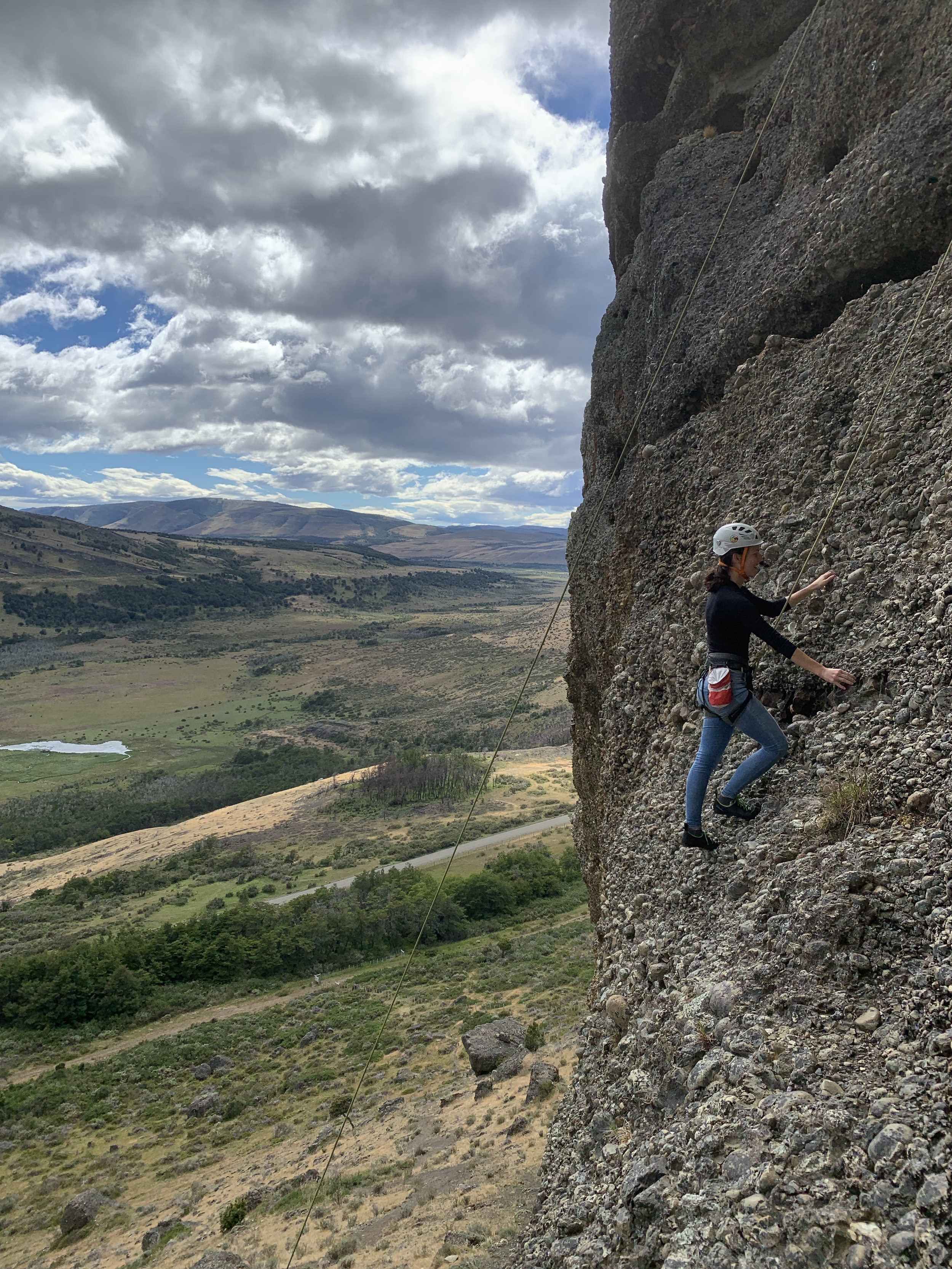 A guest rock climbing at Laguna Sofia, Puerto Natales, on a guiding climbing trip with Paine Mountain Guides, a locally owned and operated guides company that run many different trips in Torres del Paine National Park, Patagonia