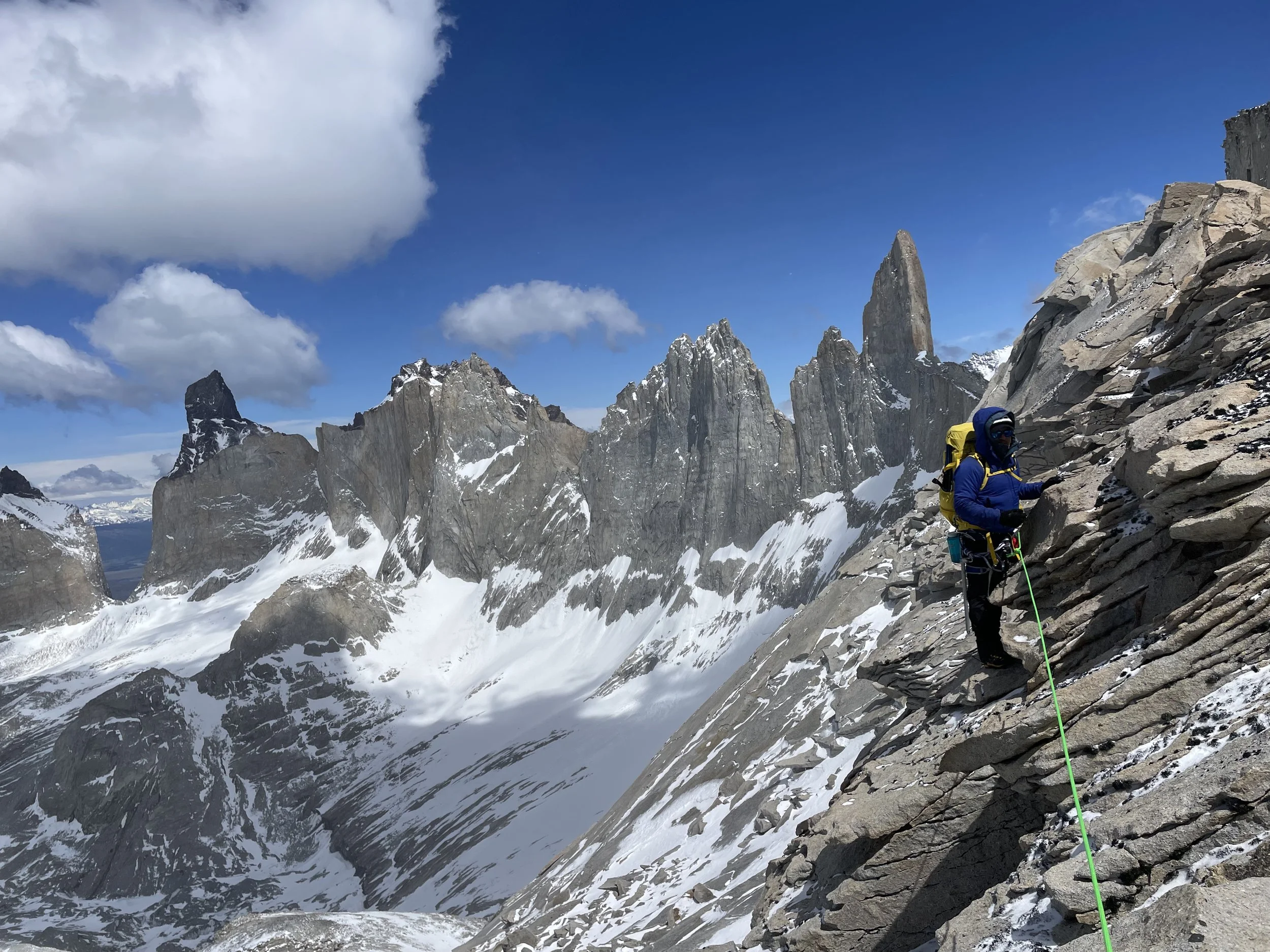 A climber in the Bader Valley, on the Roller Coaster Traverse, on a guided climbing trip with Paine Mountain Guides, a locally owned and operated guides company that run many different trips in Torres del Paine, Chilean Patagonia.