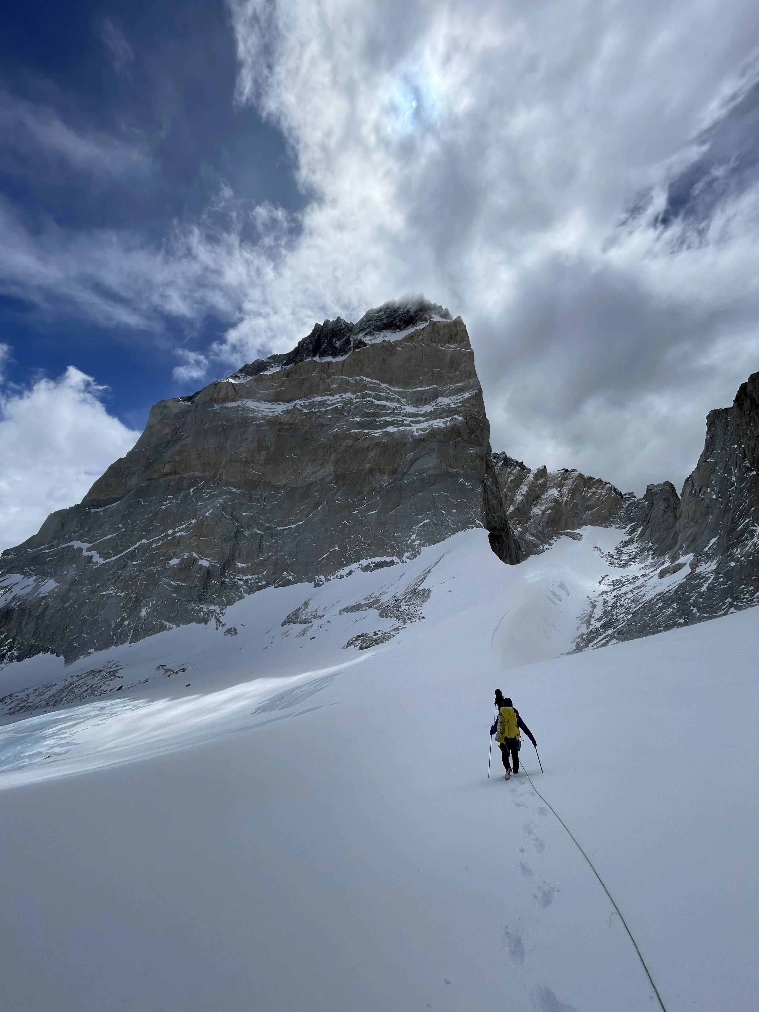 A climber in the Agostini Valley, on the Roller Coaster Traverse, on a guided climbing trip with Paine Mountain Guides, a locally owned and operated guides company that run many different trips in Torres del Paine, Chilean Patagonia.