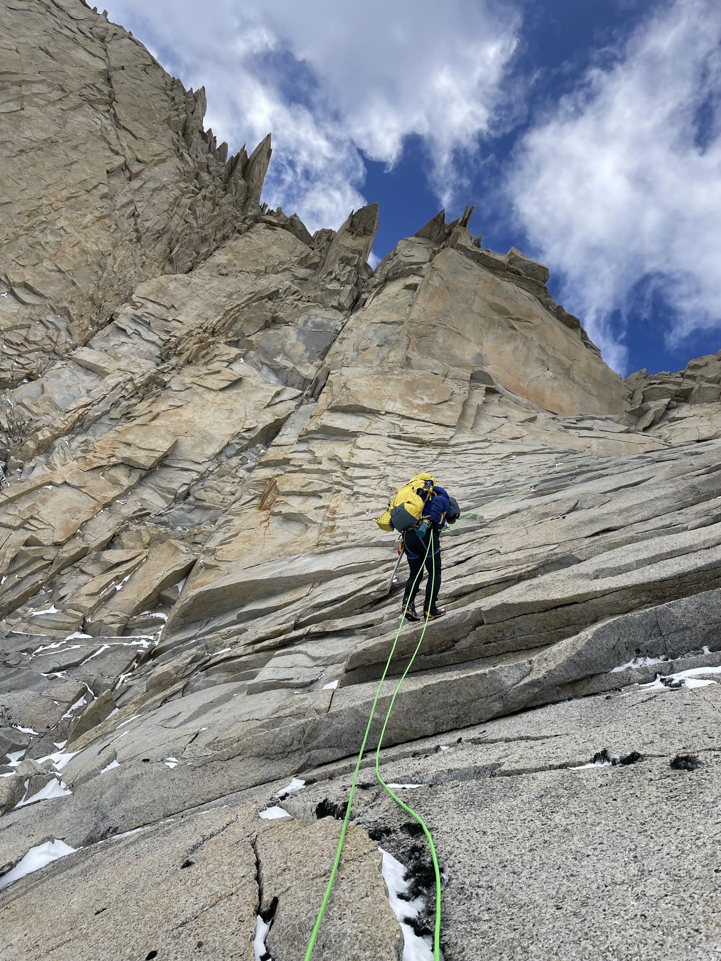 A guest rapelling into the Agostini Valley, on the Roller Coaster Traverse, on a guided climbing trip with Paine Mountain Guides, a locally owned and operated guides company that run many different trips in Torres del Paine, Chilean Patagonia.