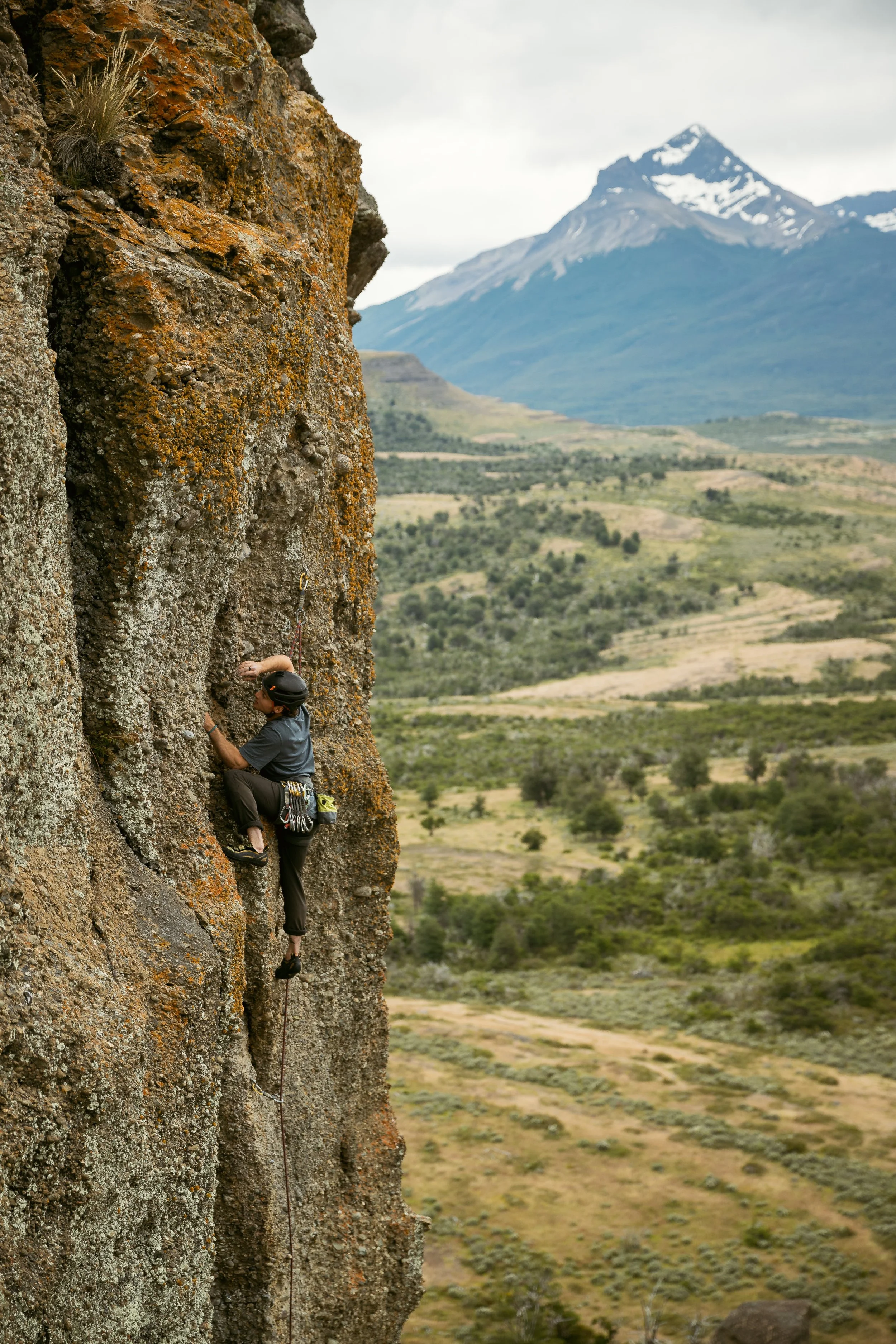 A guest rock climbing at Laguna Sofia, Puerto Natales, on a guiding climbing trip with Paine Mountain Guides, a locally owned and operated guides company that run many different trips in Torres del Paine National Park, Patagonia