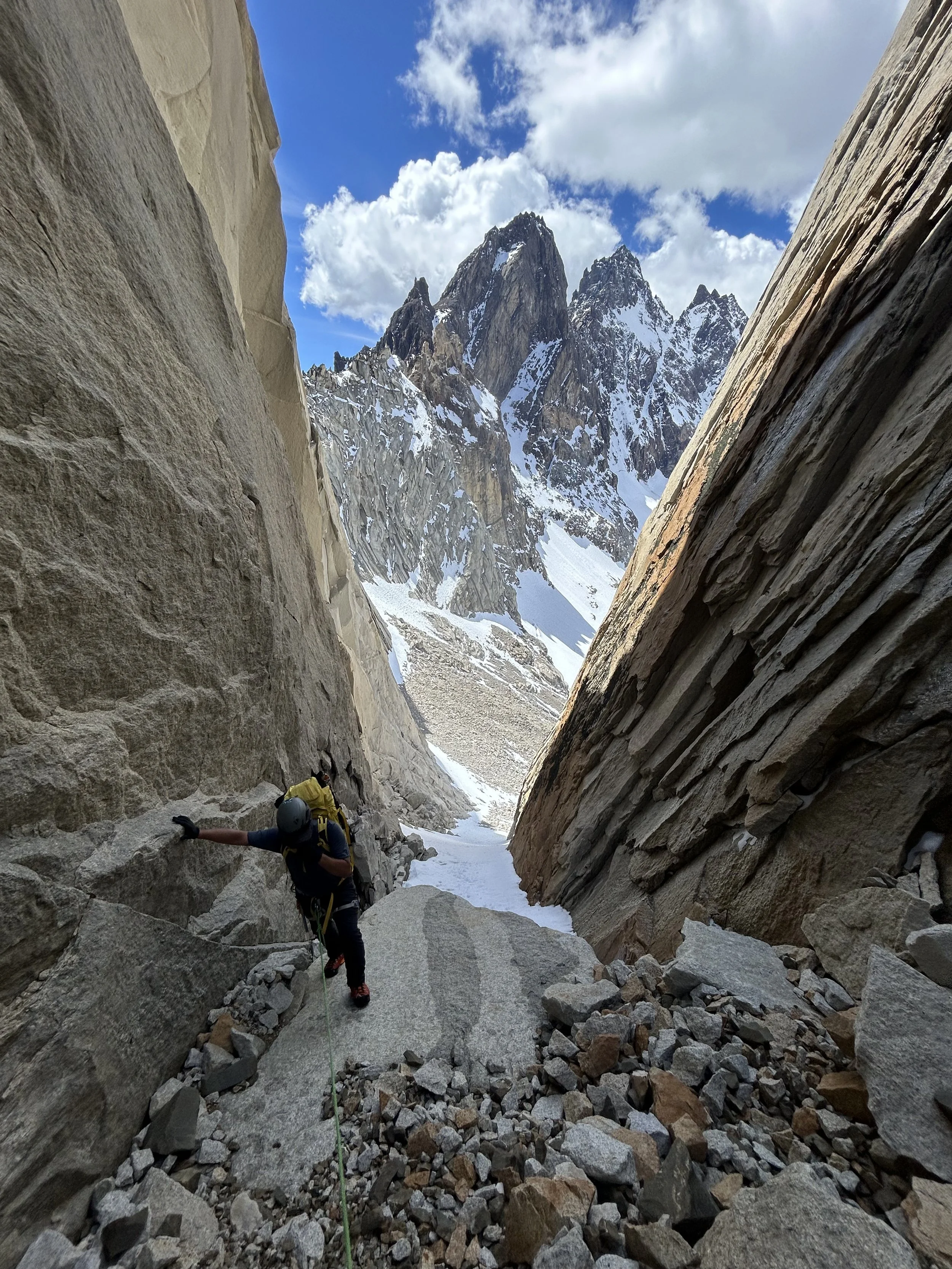A climber on the Portales Traverse, a great alternative itinerary off the beaten path, for tourists in patagonia. This trip is run by Paine Mountain Guides, and was invented by them to create fun back country trekking alternatives in Torres del Paine