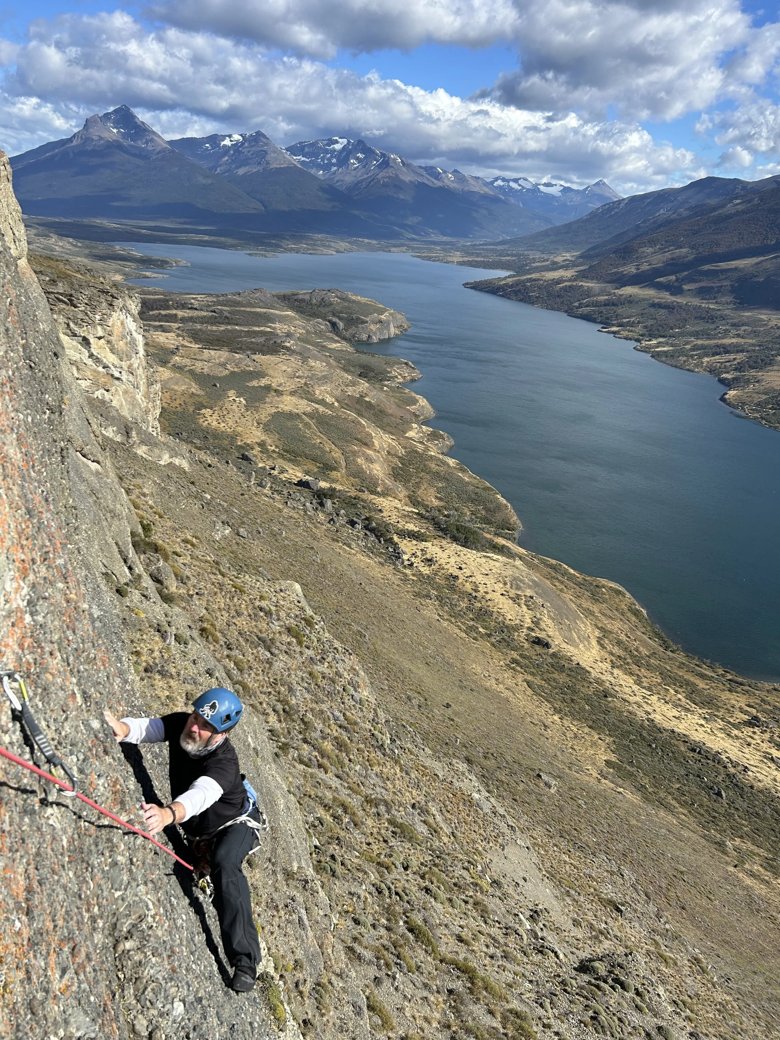 A guest rock climbing at Laguna Sofia, Puerto Natales, on a guiding climbing trip with Paine Mountain Guides, a locally owned and operated guides company that run many different trips in Torres del Paine National Park, Patagonia