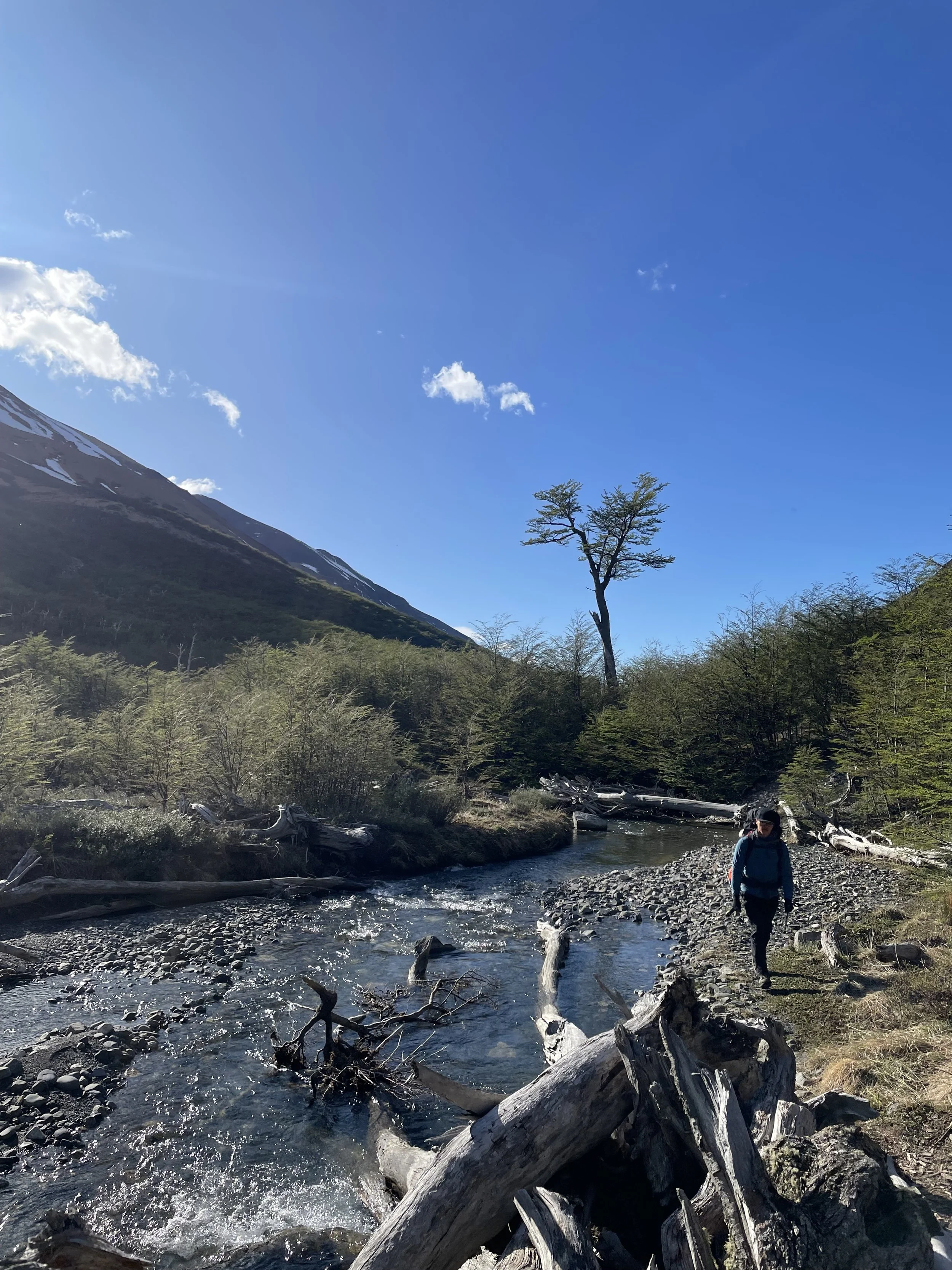 A hiker near Campamento Japones, on a guided climbing trip with Paine Mountain Guides, a locally owned and operated guides company that run many different trips in Torres del Paine, in Chilean patagonia.