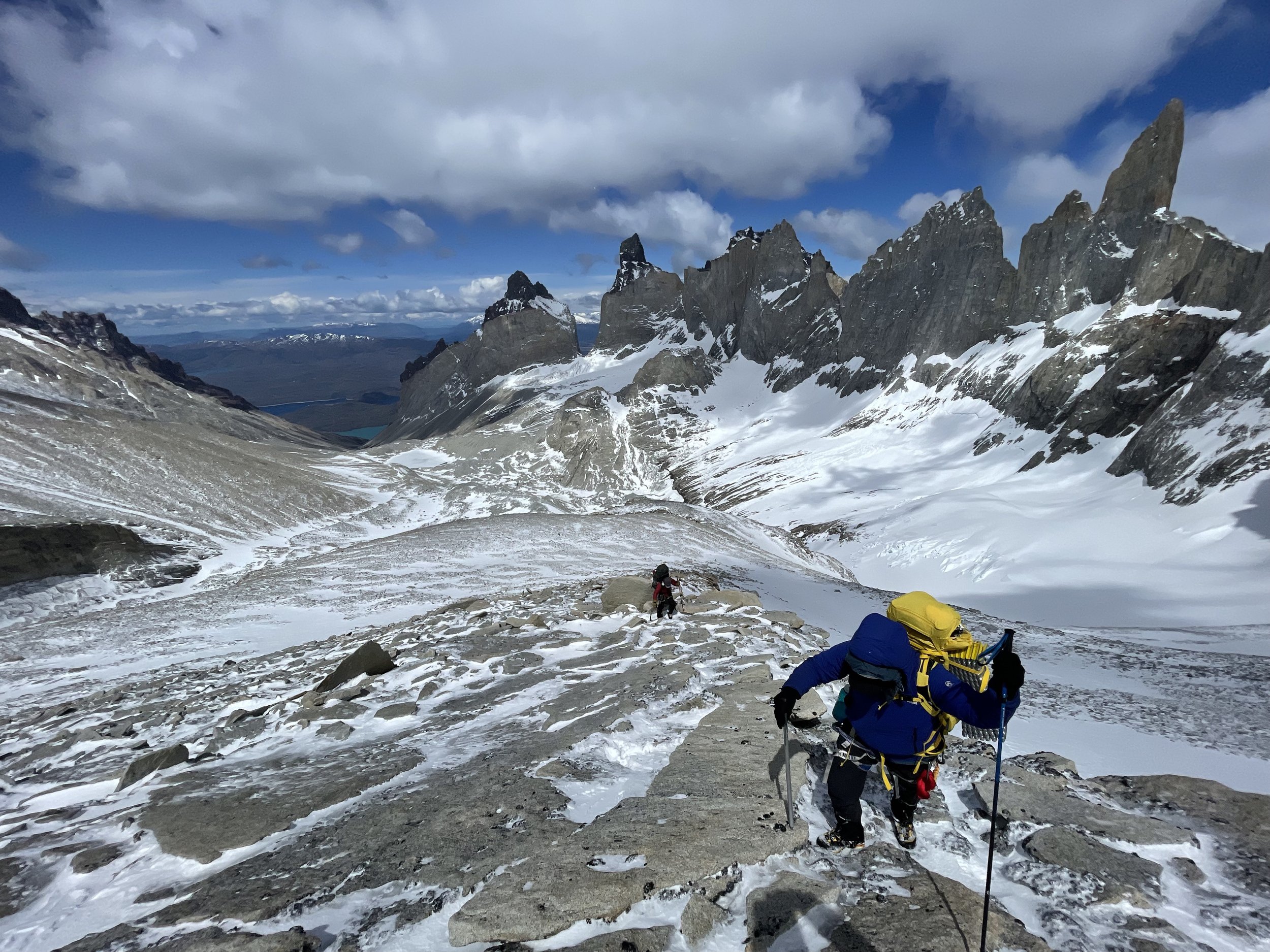 A climber in the Bader Valley, on the Roller Coaster Traverse, on a guided climbing trip with Paine Mountain Guides, a locally owned and operated guides company that run many different trips in Torres del Paine, Chilean Patagonia.