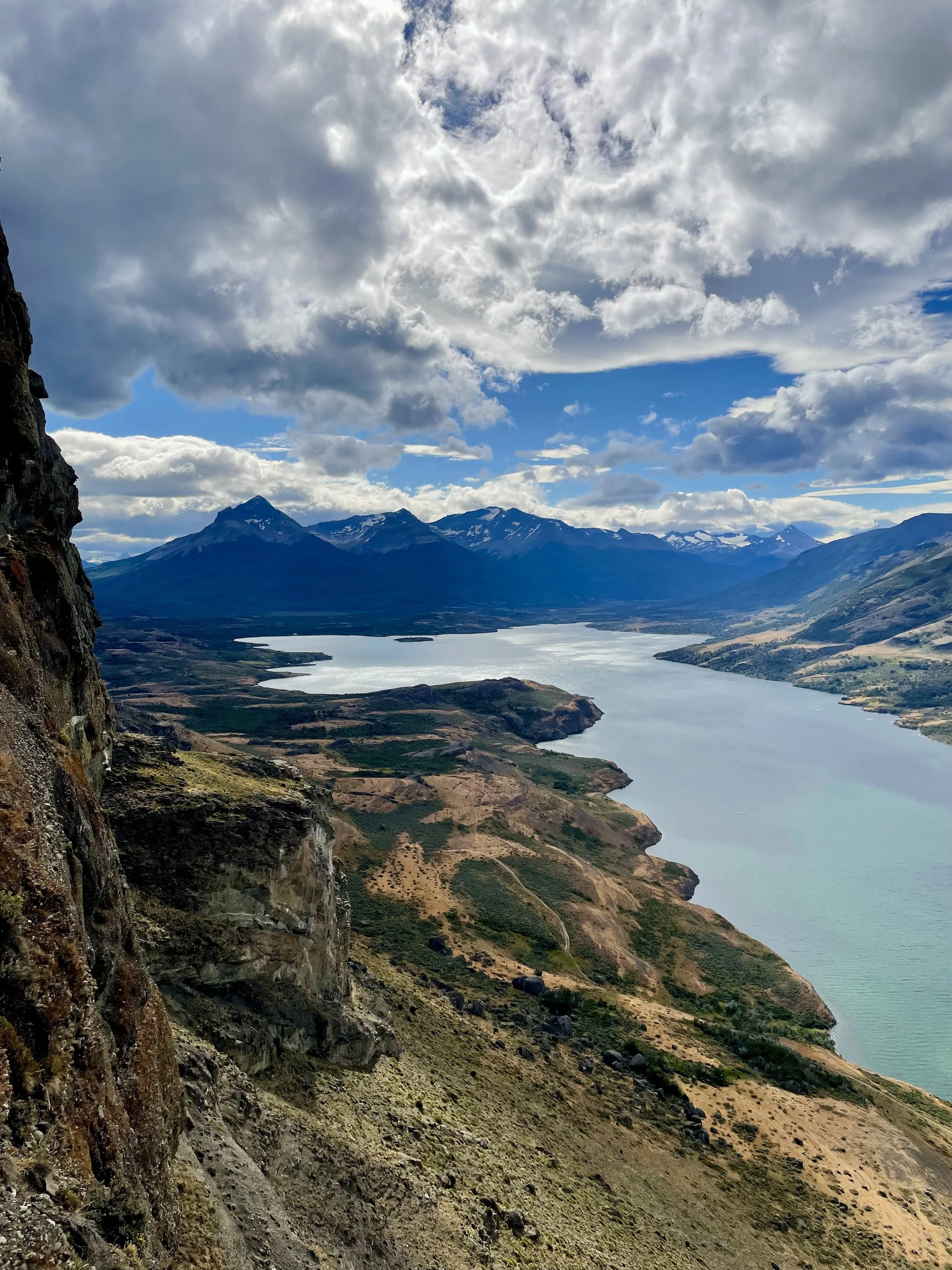 View of laguna sofia, from the top of a multi pitch rock climb, on a guided climbing trip with Paine Mountain Guides, a locally owned and operated guides company that run many different trips in Torres del Paine, Chilean Patagonia.