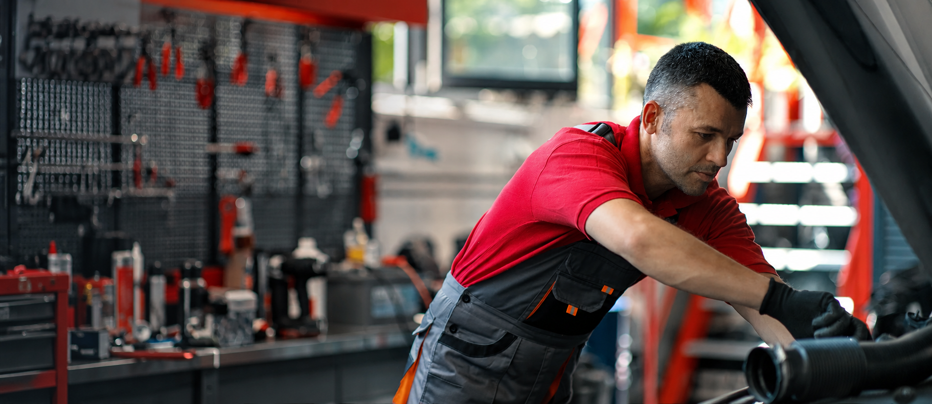 Mechanic in cinematic auto shop.png