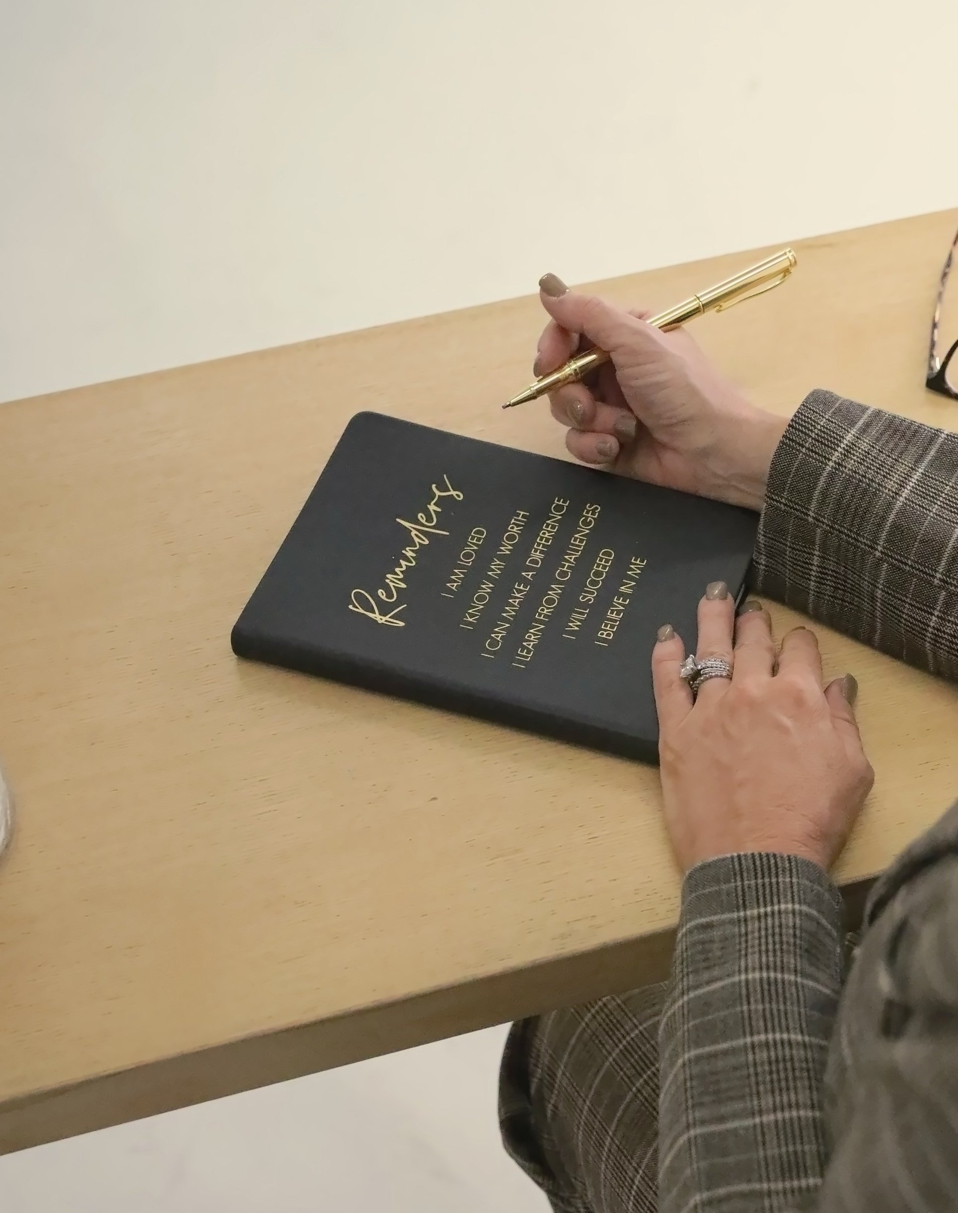 Wende Valentine writing in her journal