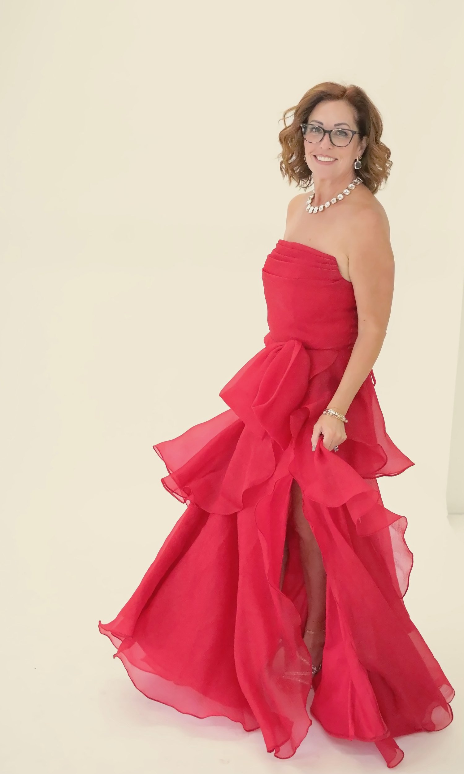 Wende Valentine in a flowing red gown