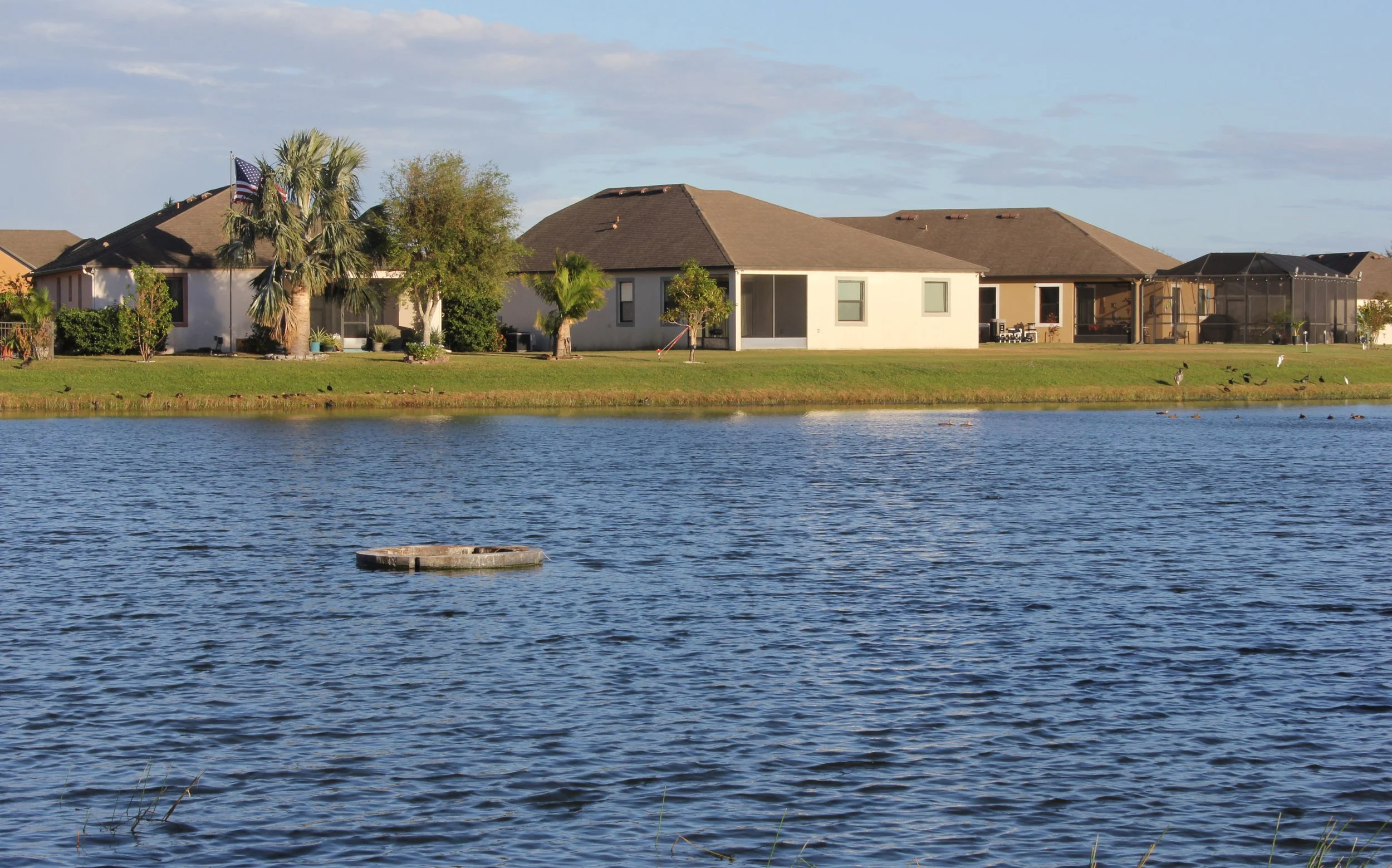 Backyard overlooking the water at a Northwest Louisiana lake home