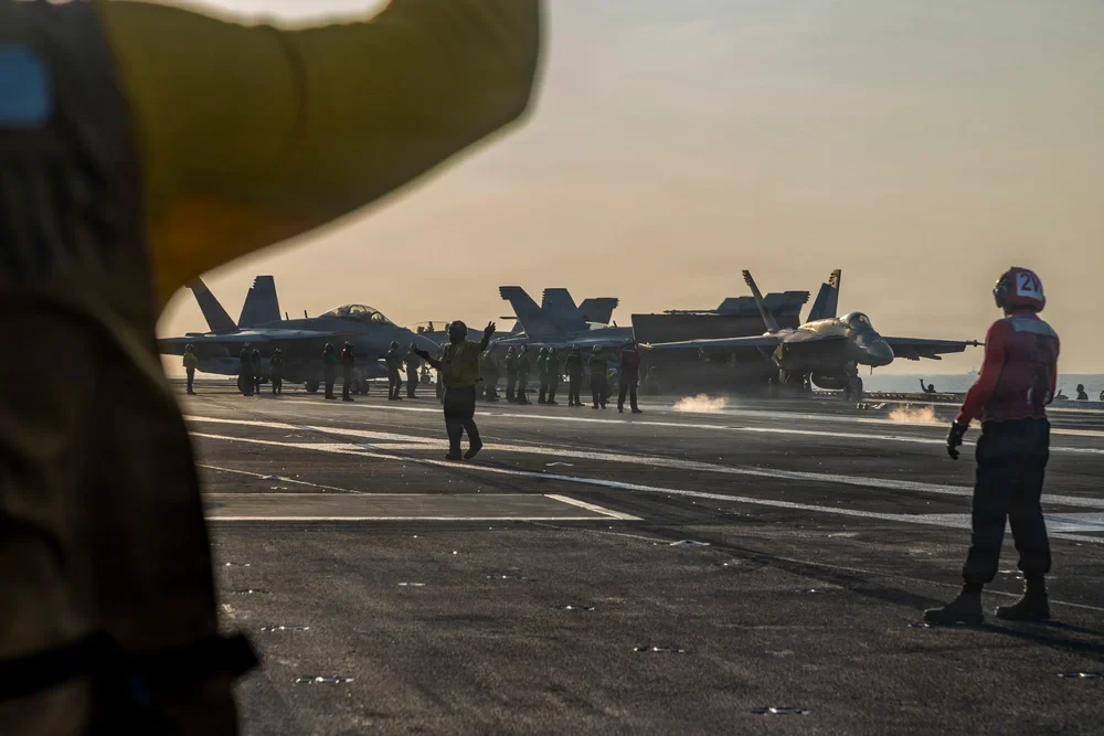 F/A-18E Super Hornet preparing to launch from USS Abraham Lincoln in the Arabian Sea.