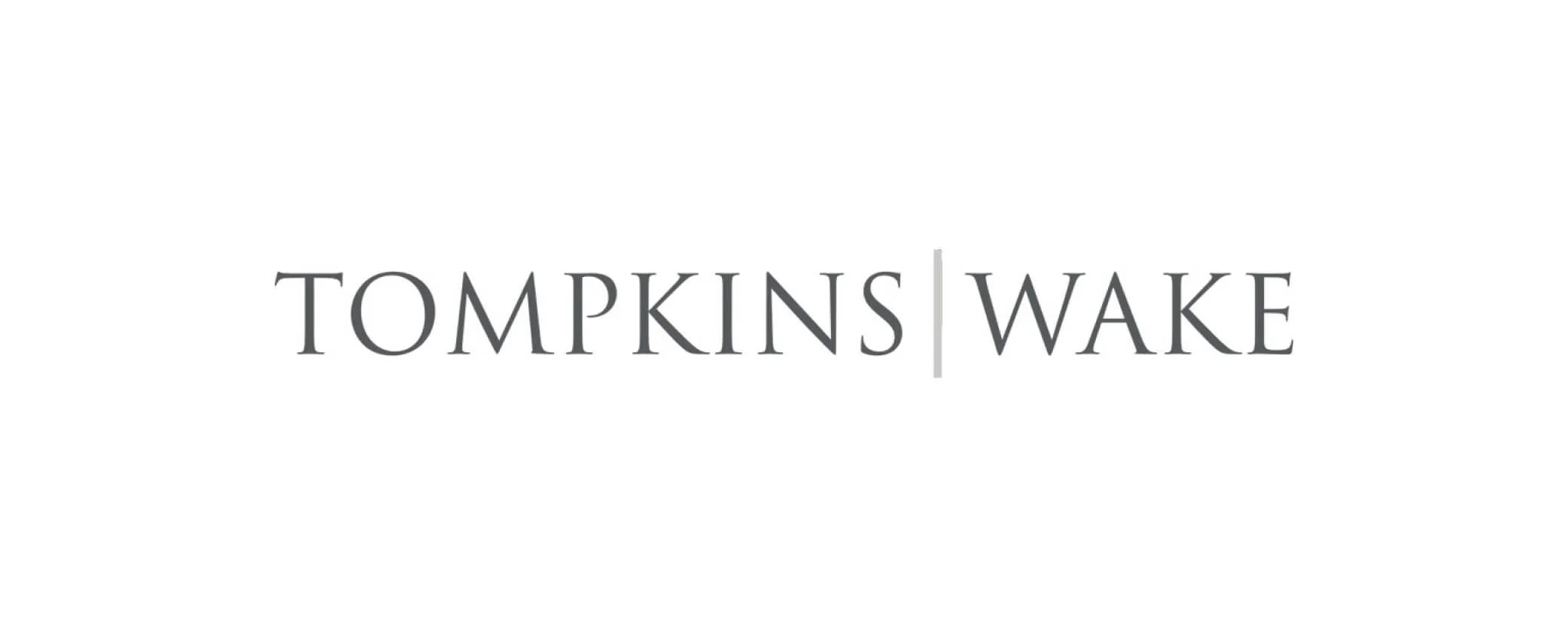 Tompkins Wake logo in black and white with a white background.