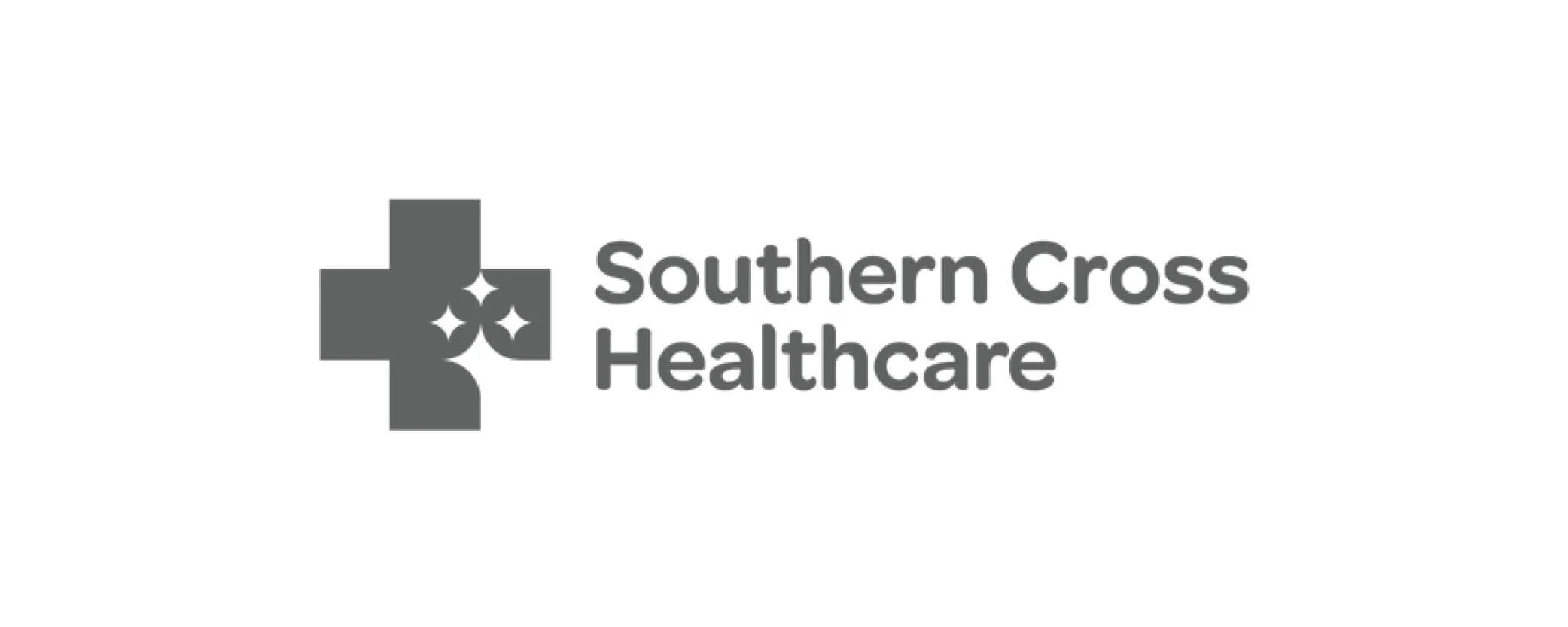 Southern Cross Healthcare logo with a gray cross and sparkling stars.