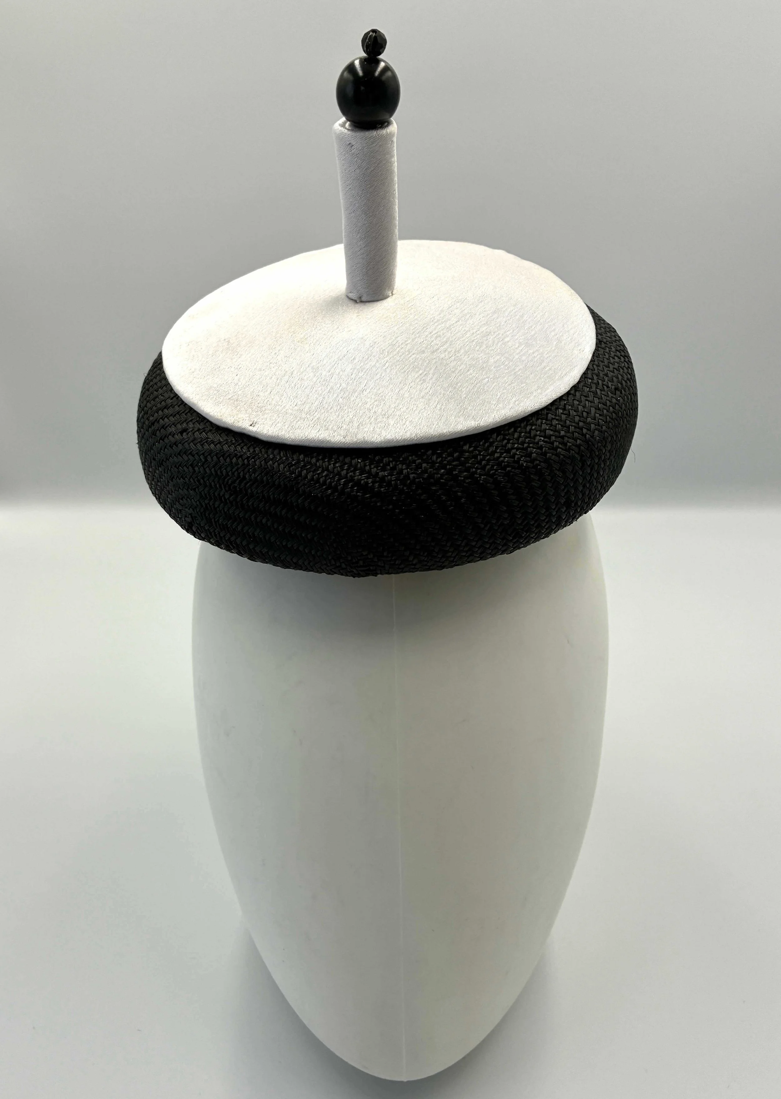 Black and White Button Hat with Beaded Tail