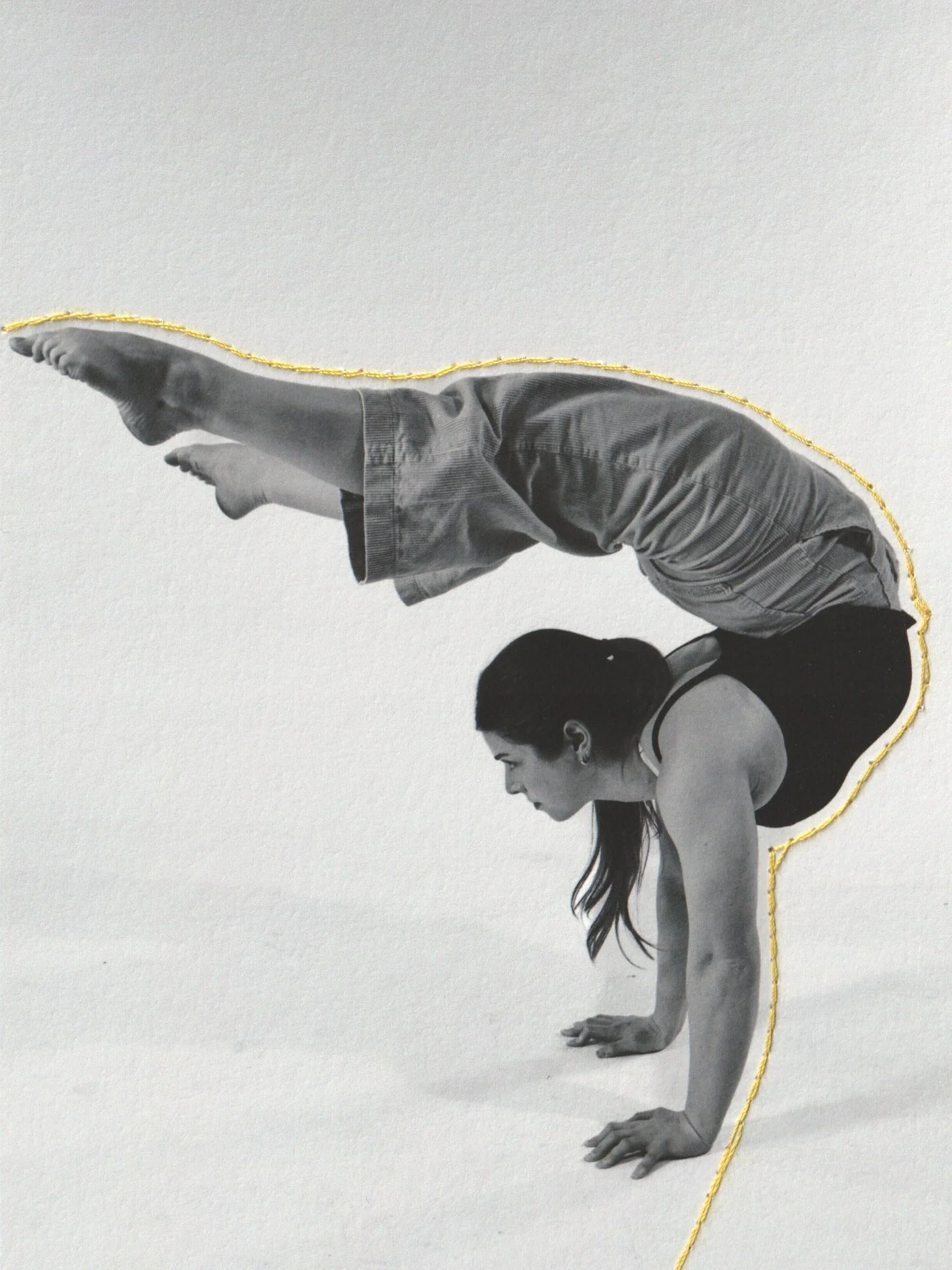 Black-and-white photo of a woman in a circus pose, with her hands and feet on the ground and her body lifted into a plank position. The woman is wearing a tank top and has long hair, and her face is focused and calm, collage, circus, photography.