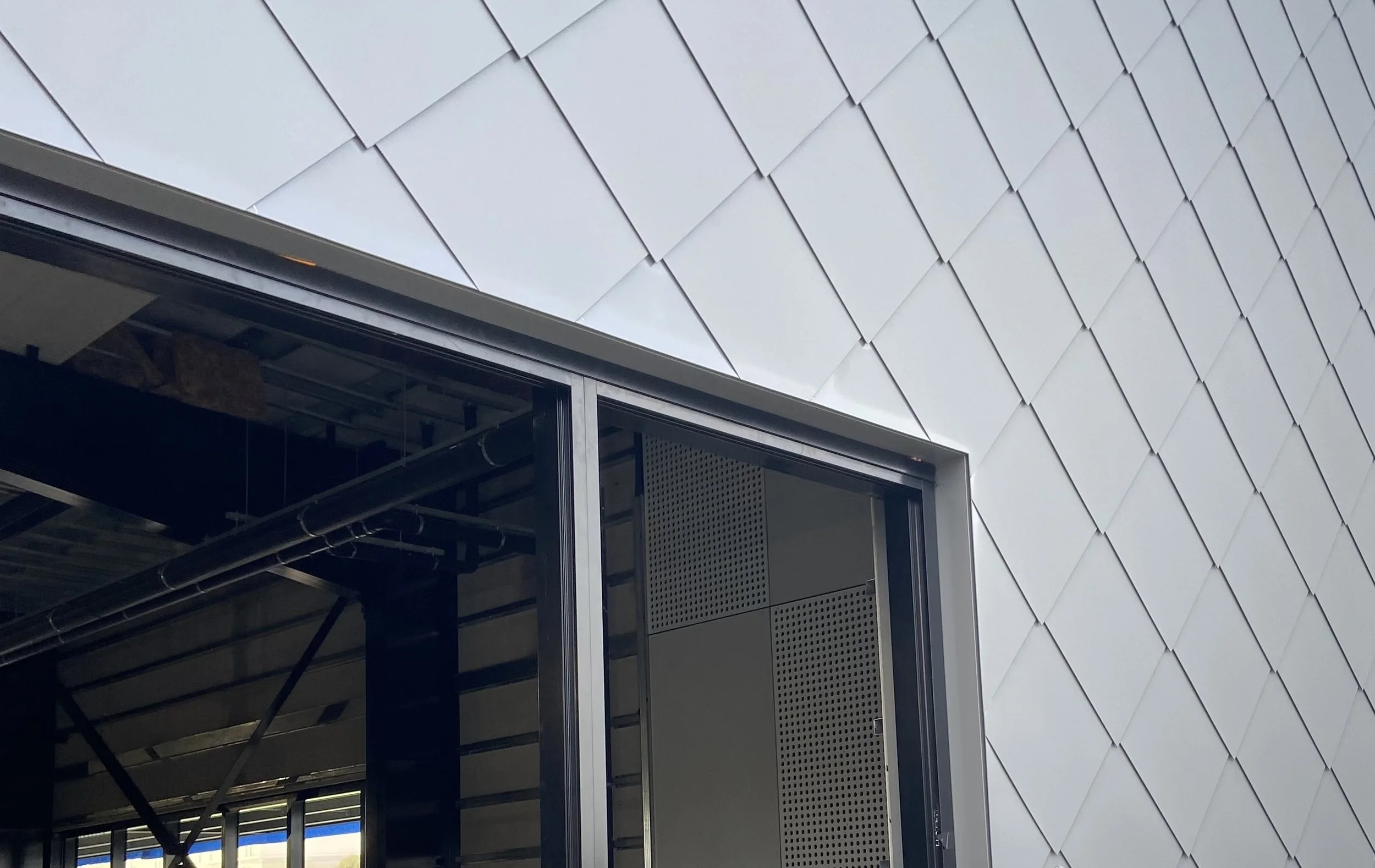 Diamond shingle cladding