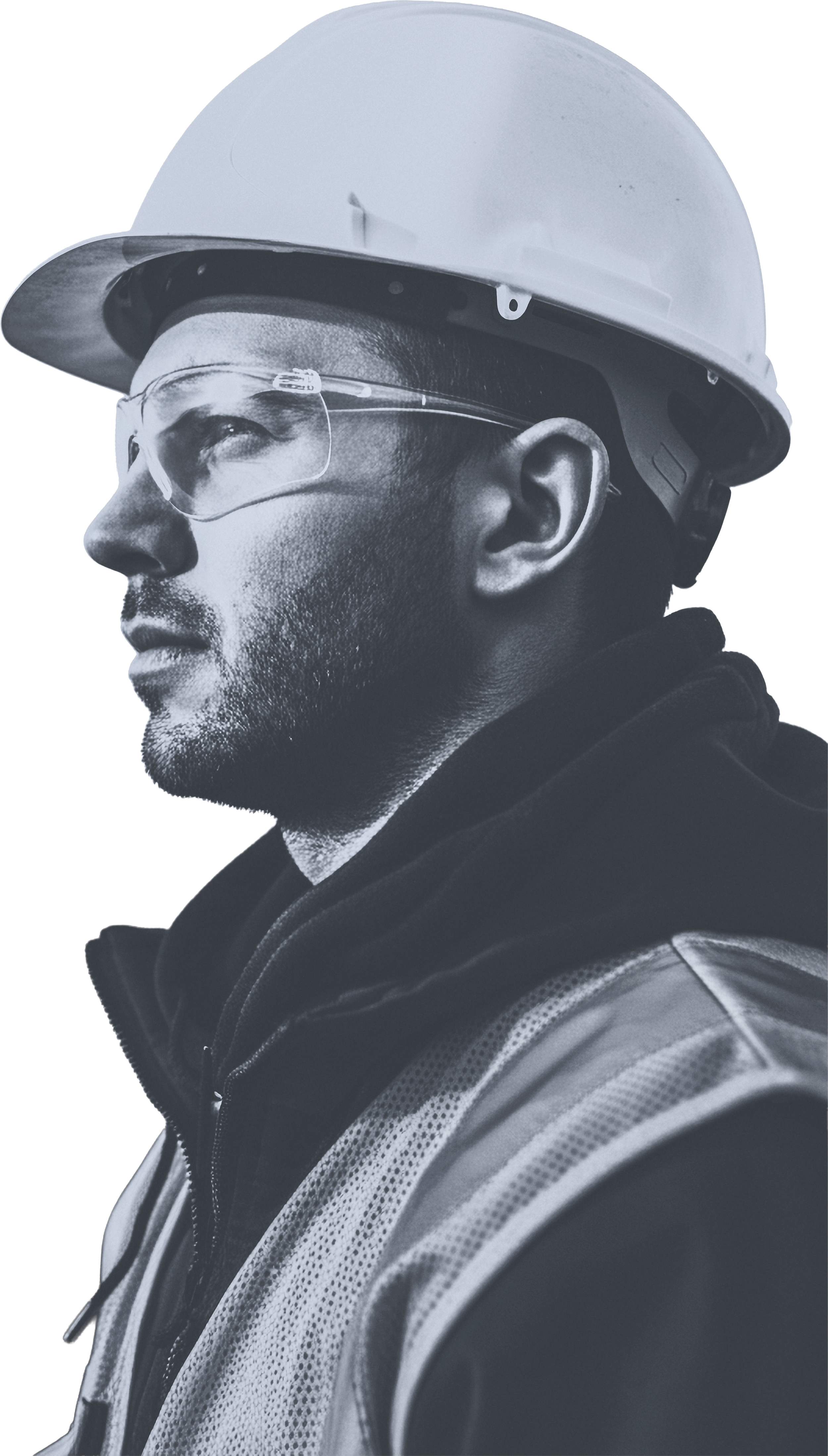 Profile of a man wearing a safety helmet, goggles, and a high-visibility vest, looking to the side.