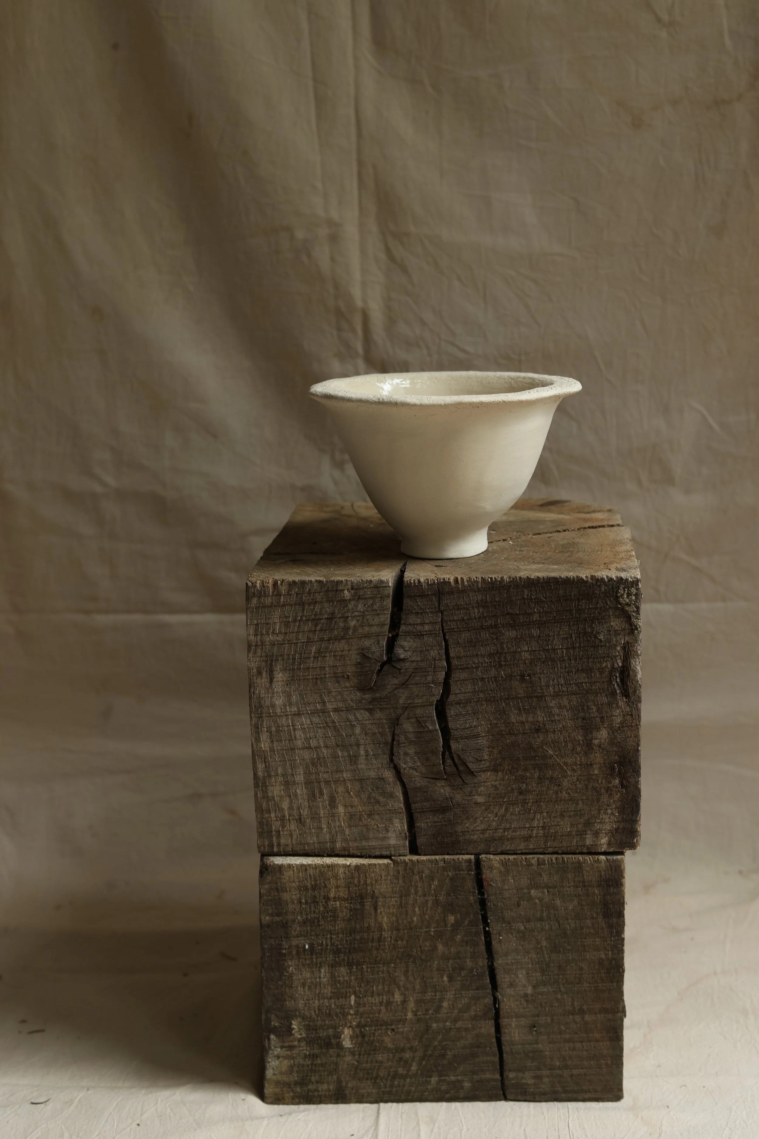 Bowl with fluted lip